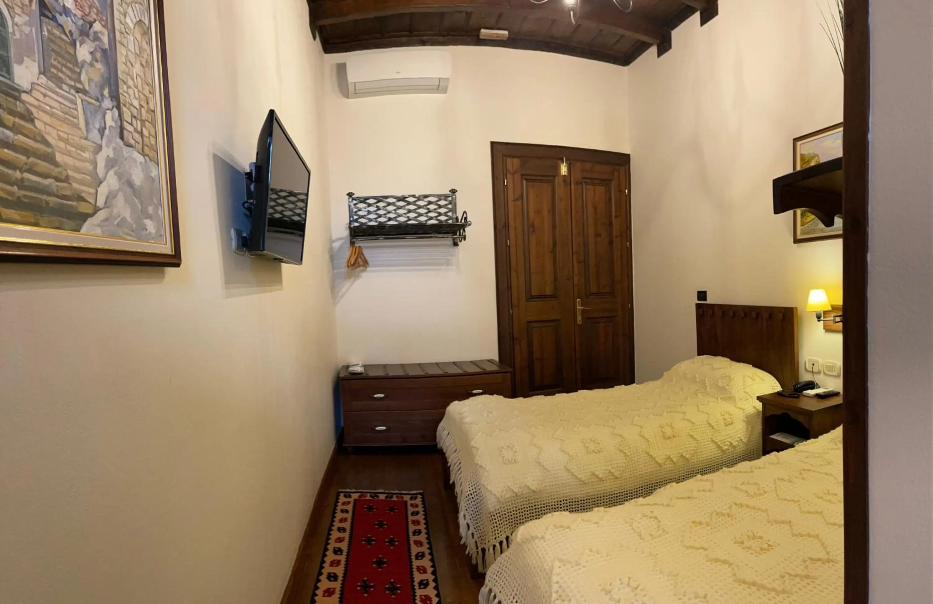 Bed in Hotel Mangalemi