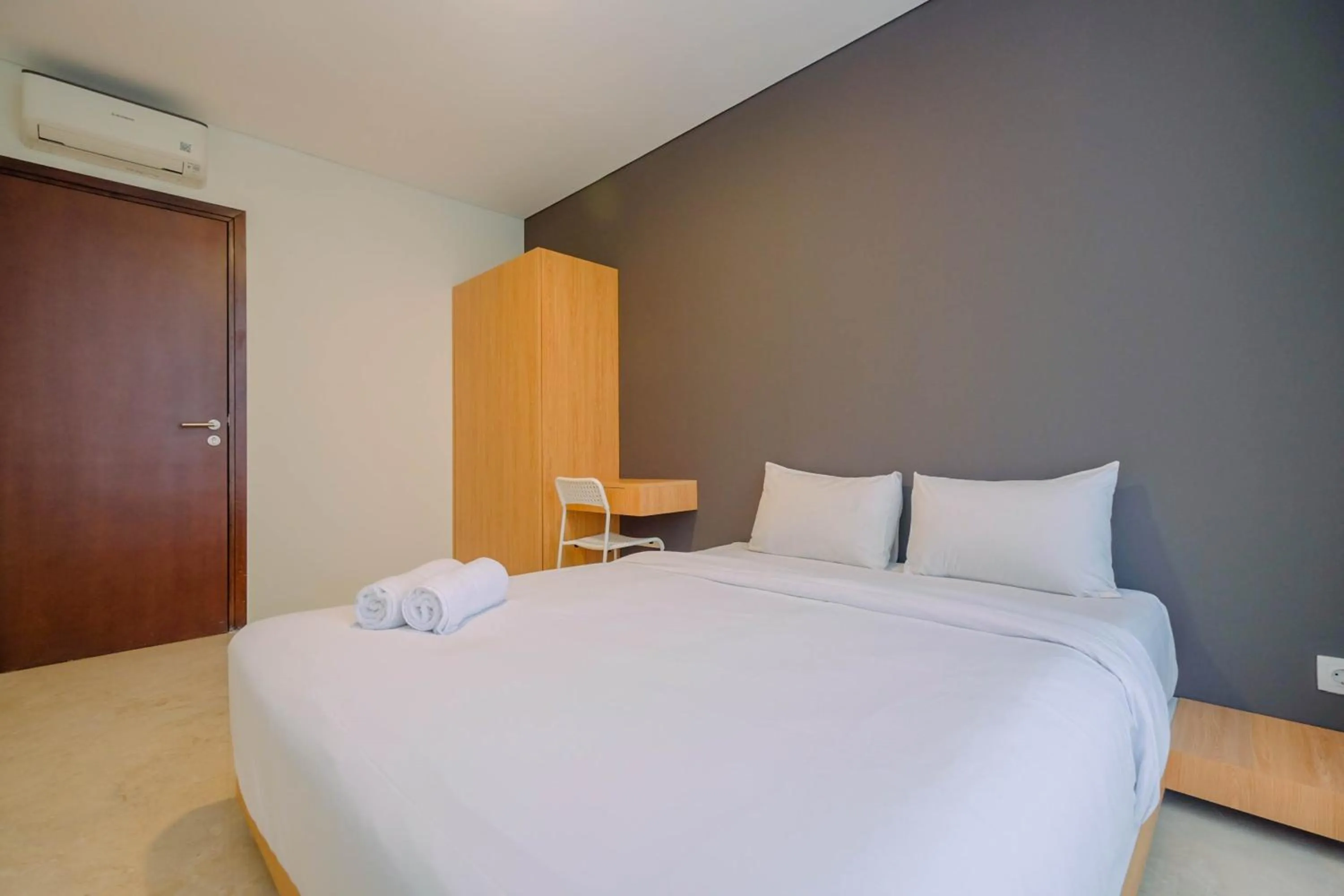 Modern and Spacious 2BR L'Avenue Apartment By Travelio