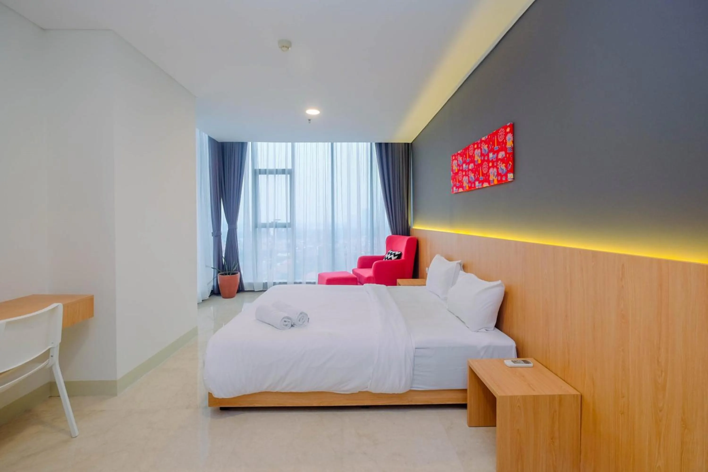 Modern and Spacious 2BR L'Avenue Apartment By Travelio