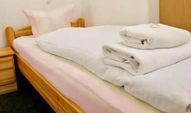 Bed in Hotel Sickinger Hof