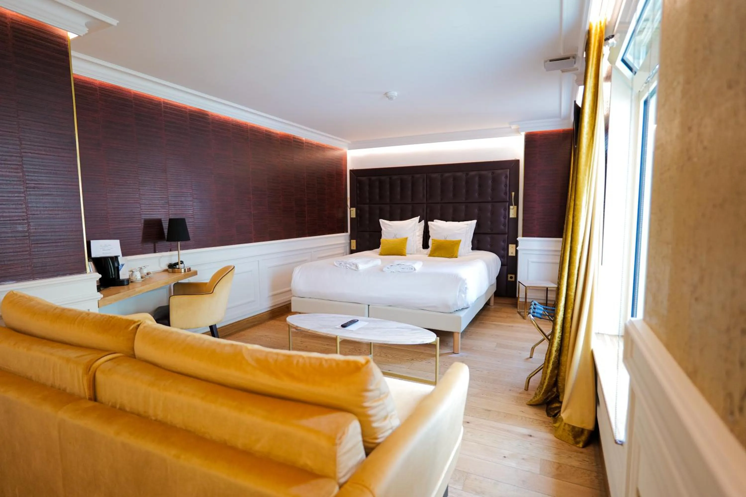 Bed in Hôtel Merveilleux Côté Mer