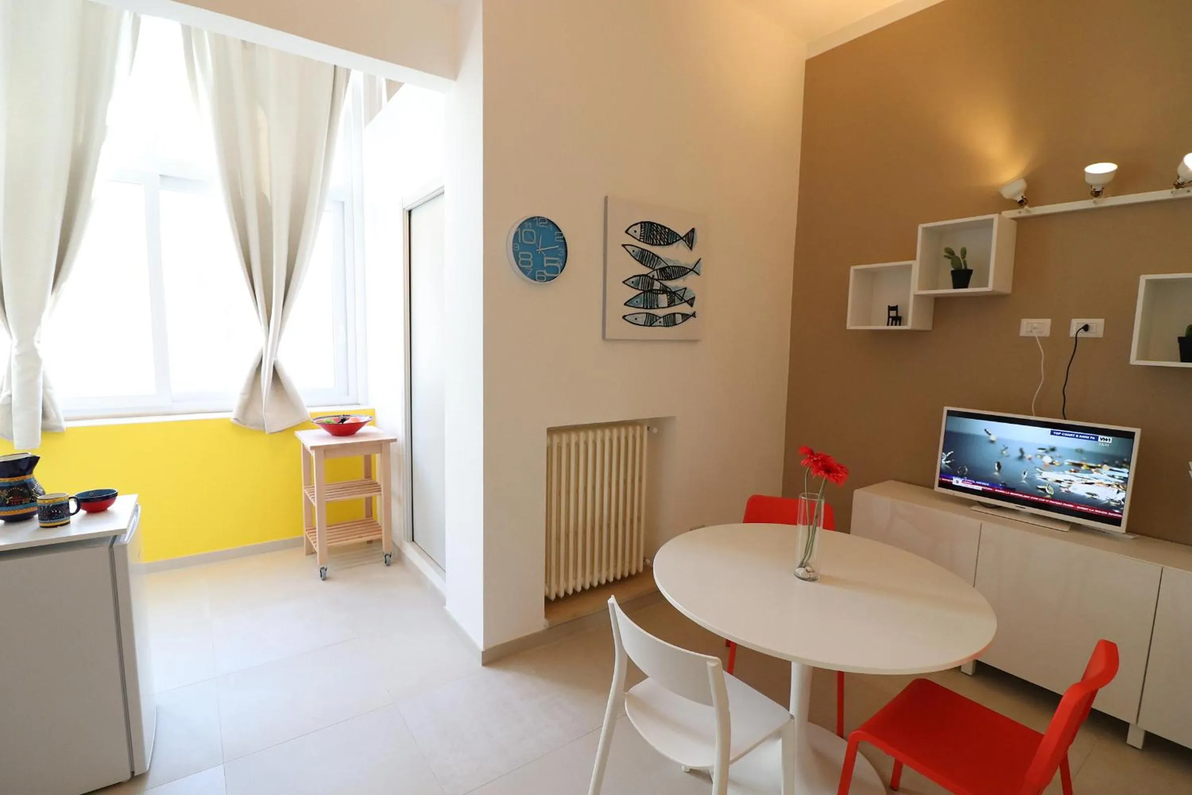 Communal lounge/ TV room, Kitchen/Kitchenette in Casa Vacanze aura a Otranto 4 posti