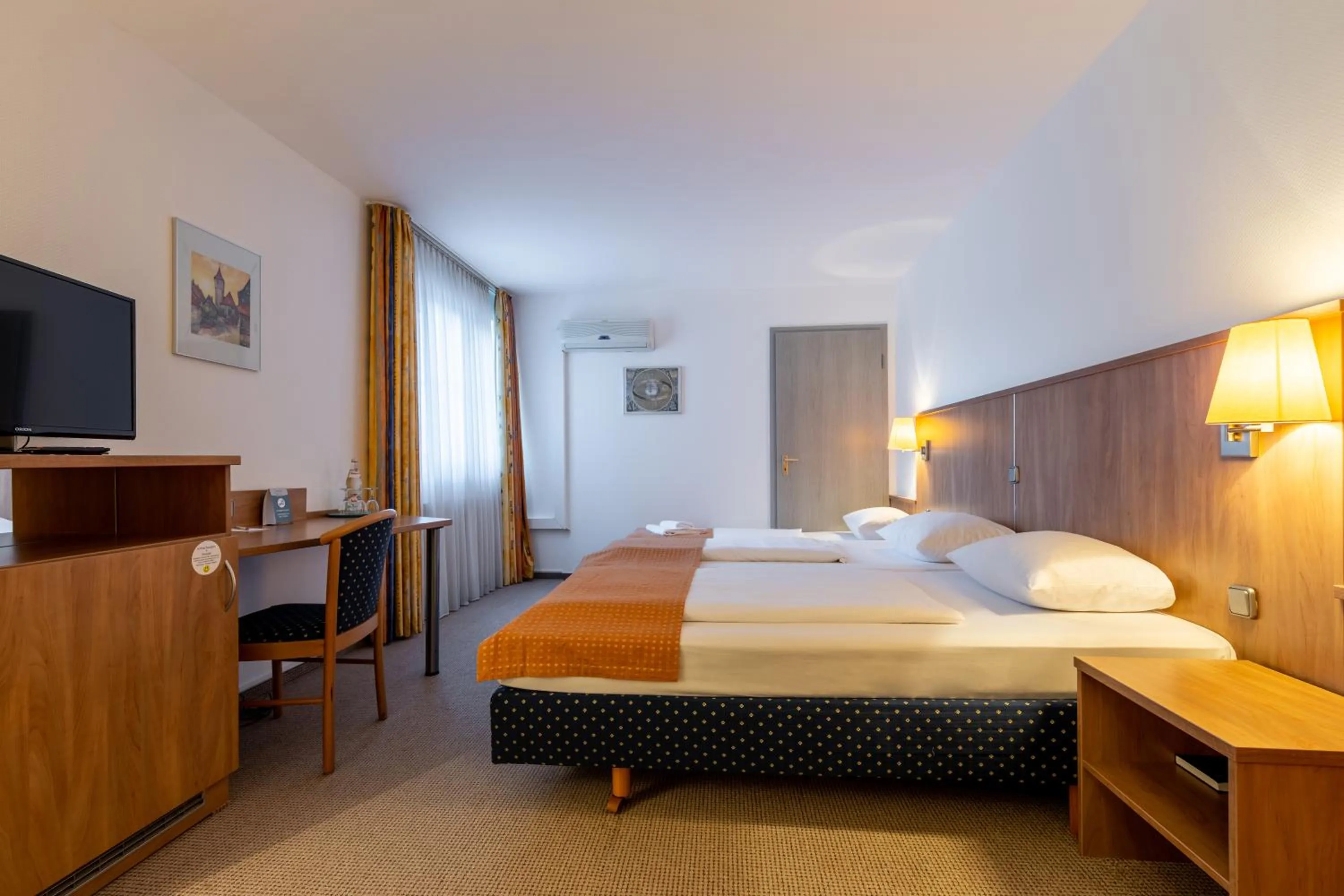 Bed in Trip Inn Kongresshotel Frankfurt-Rodgau