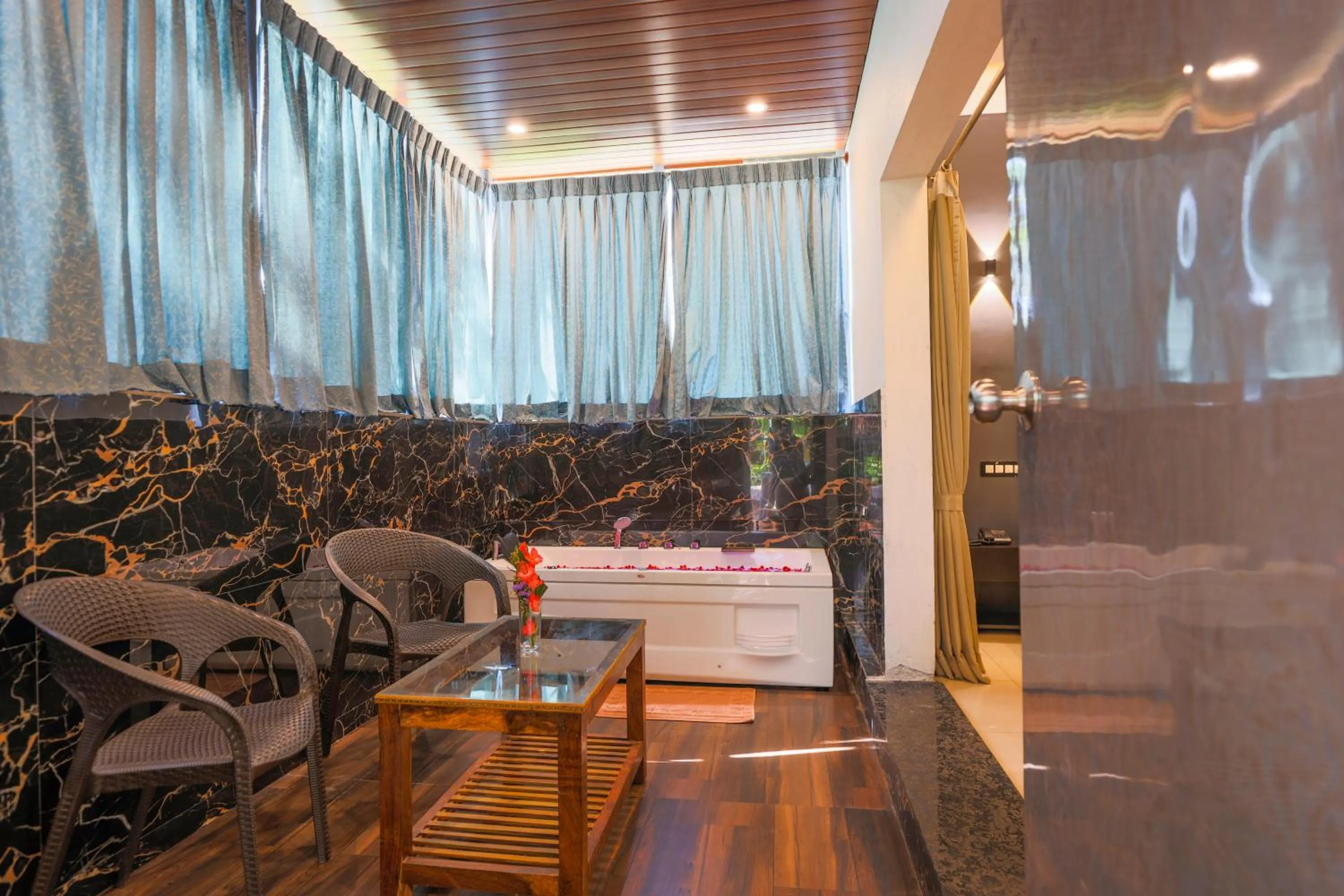 Seating area in The Blossom Resort - Chikmagalur