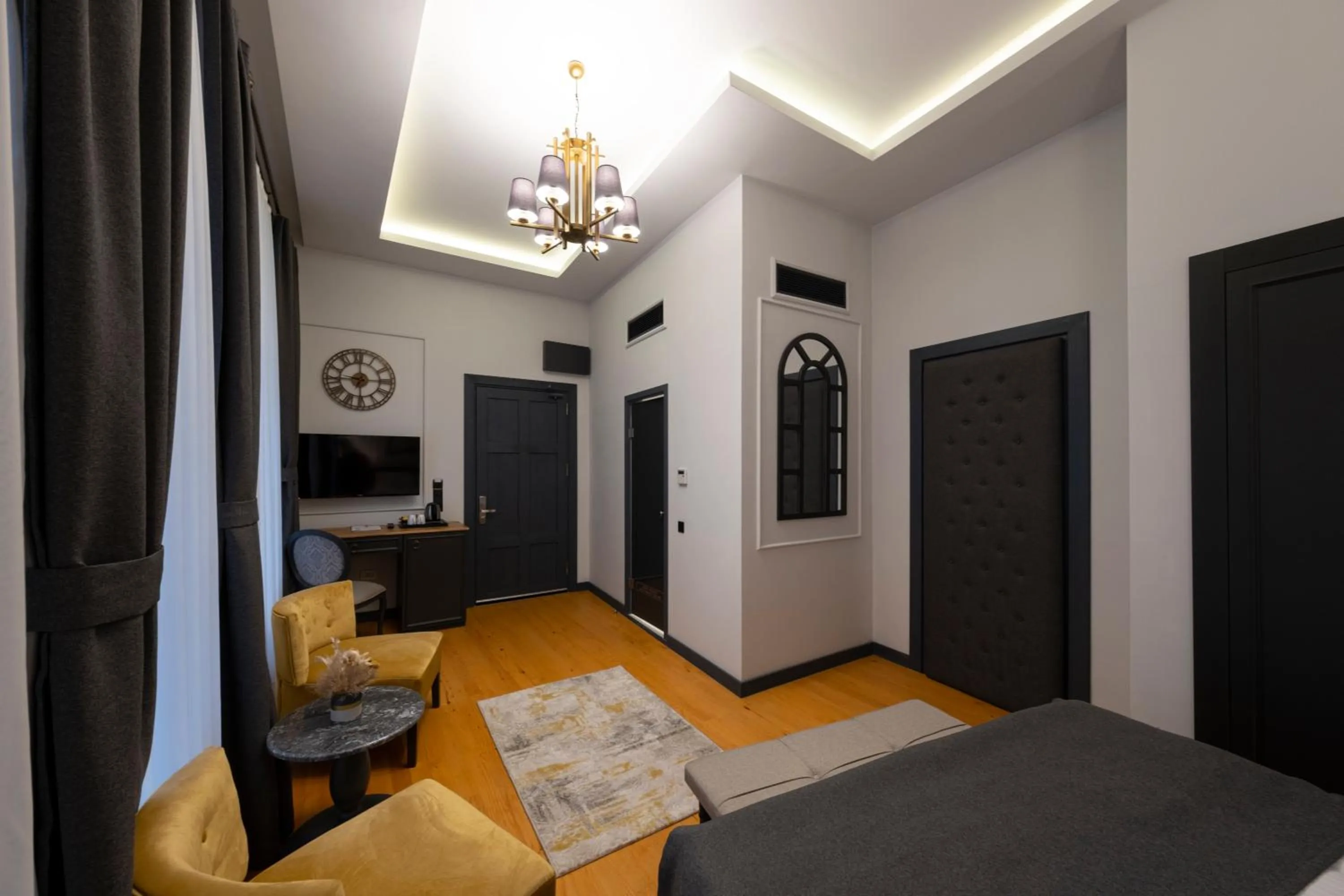 Communal lounge/ TV room, Bed in Ferman Port Hotel - Special Category