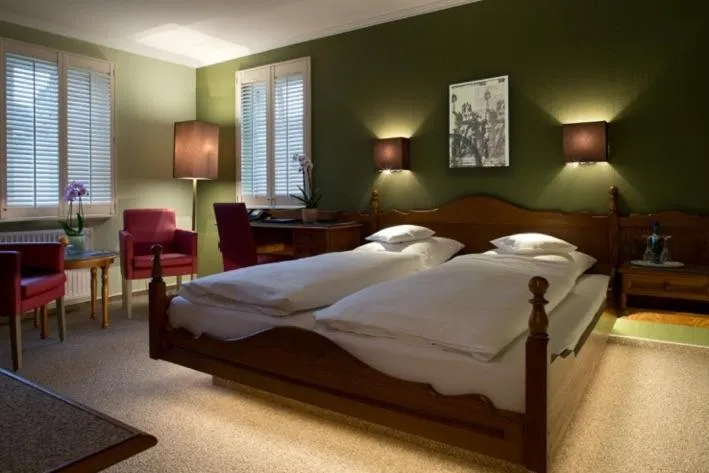 Photo of the whole room, Bed in Hotel und Weinhaus Zum Krug