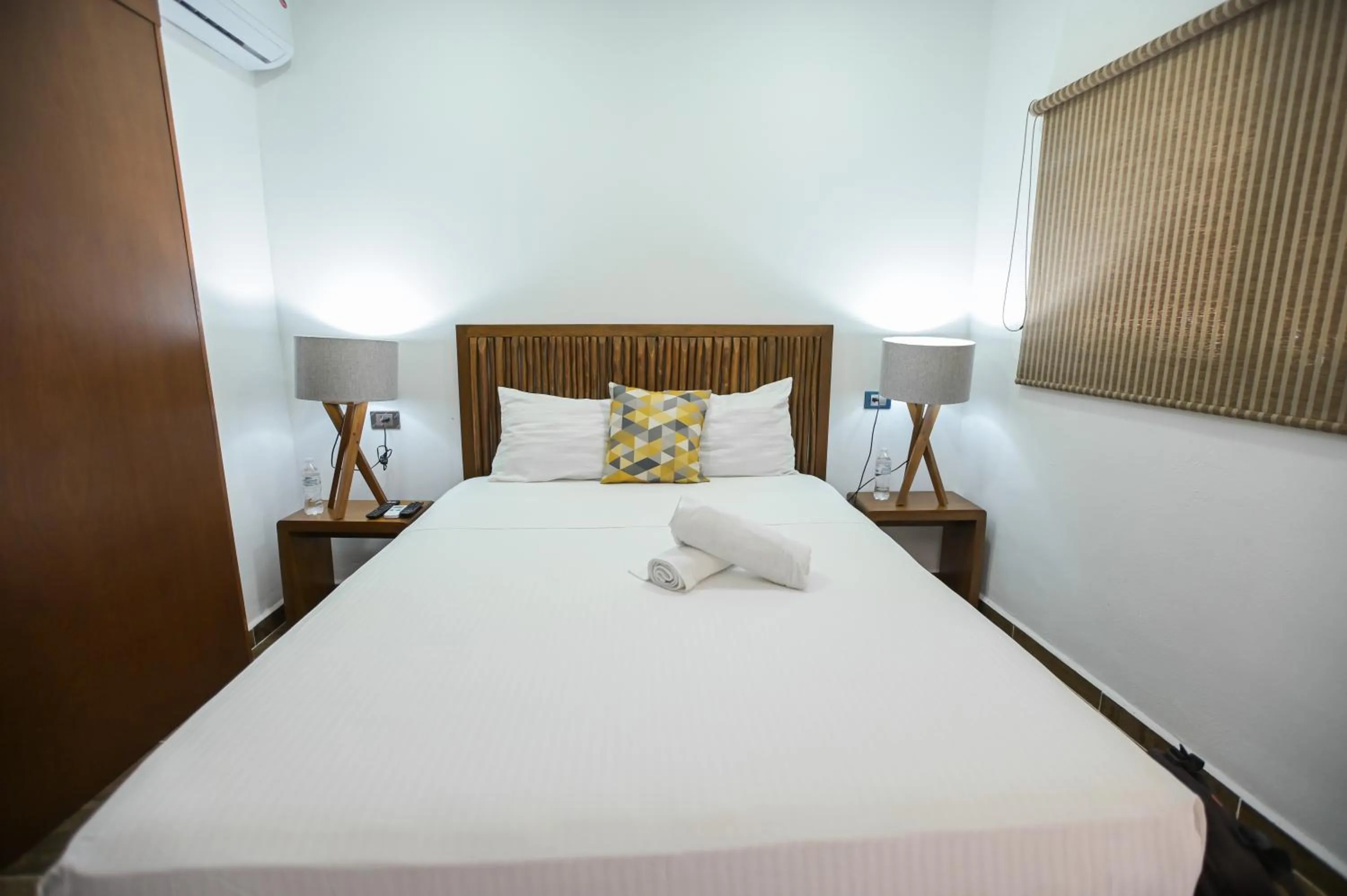 Bed in Kinta Kan Cabañas Hotel Playa del Carmen