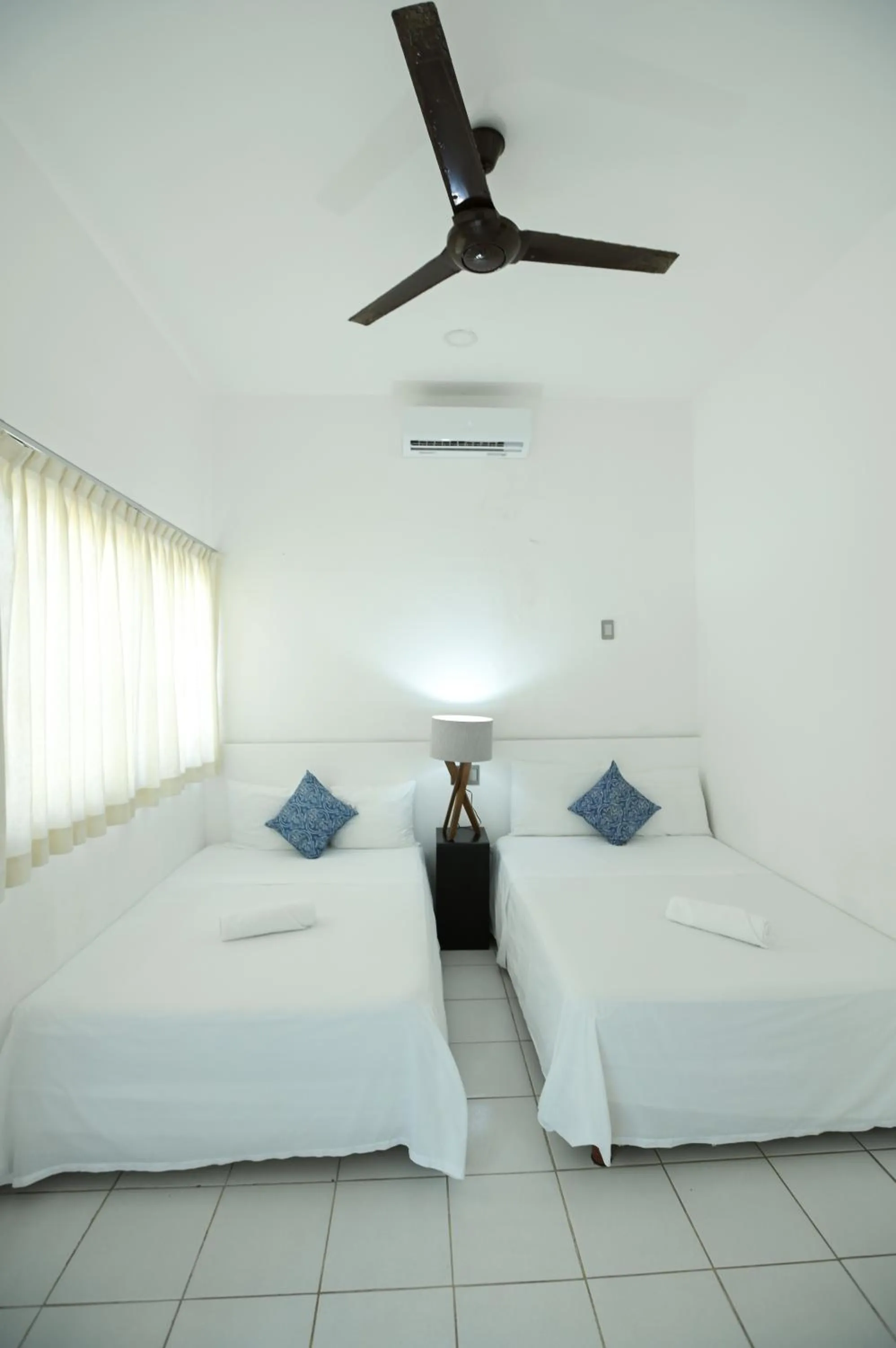 Bed in Kinta Kan Cabañas Hotel Playa del Carmen