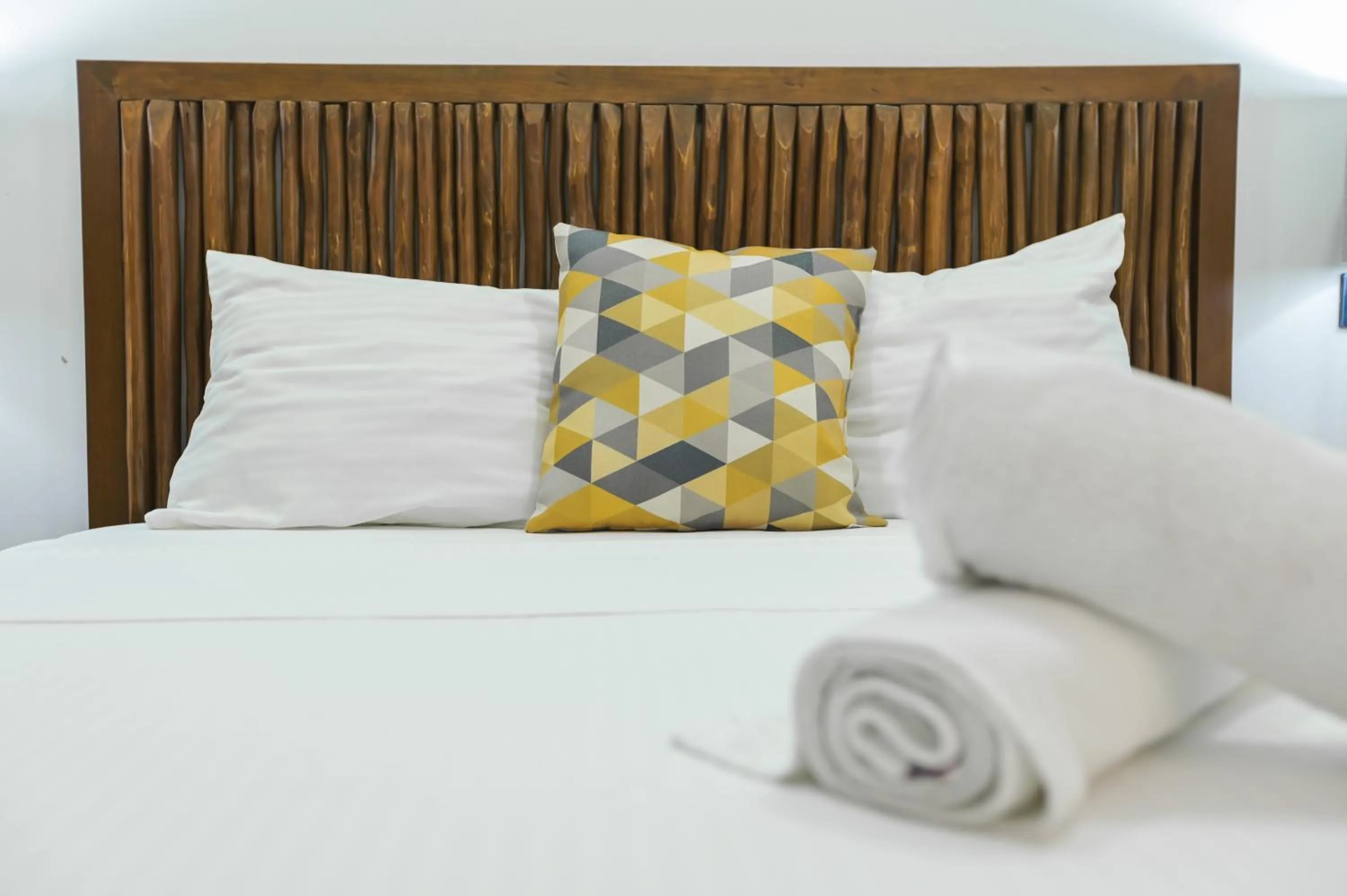 Bed in Kinta Kan Cabañas Hotel Playa del Carmen