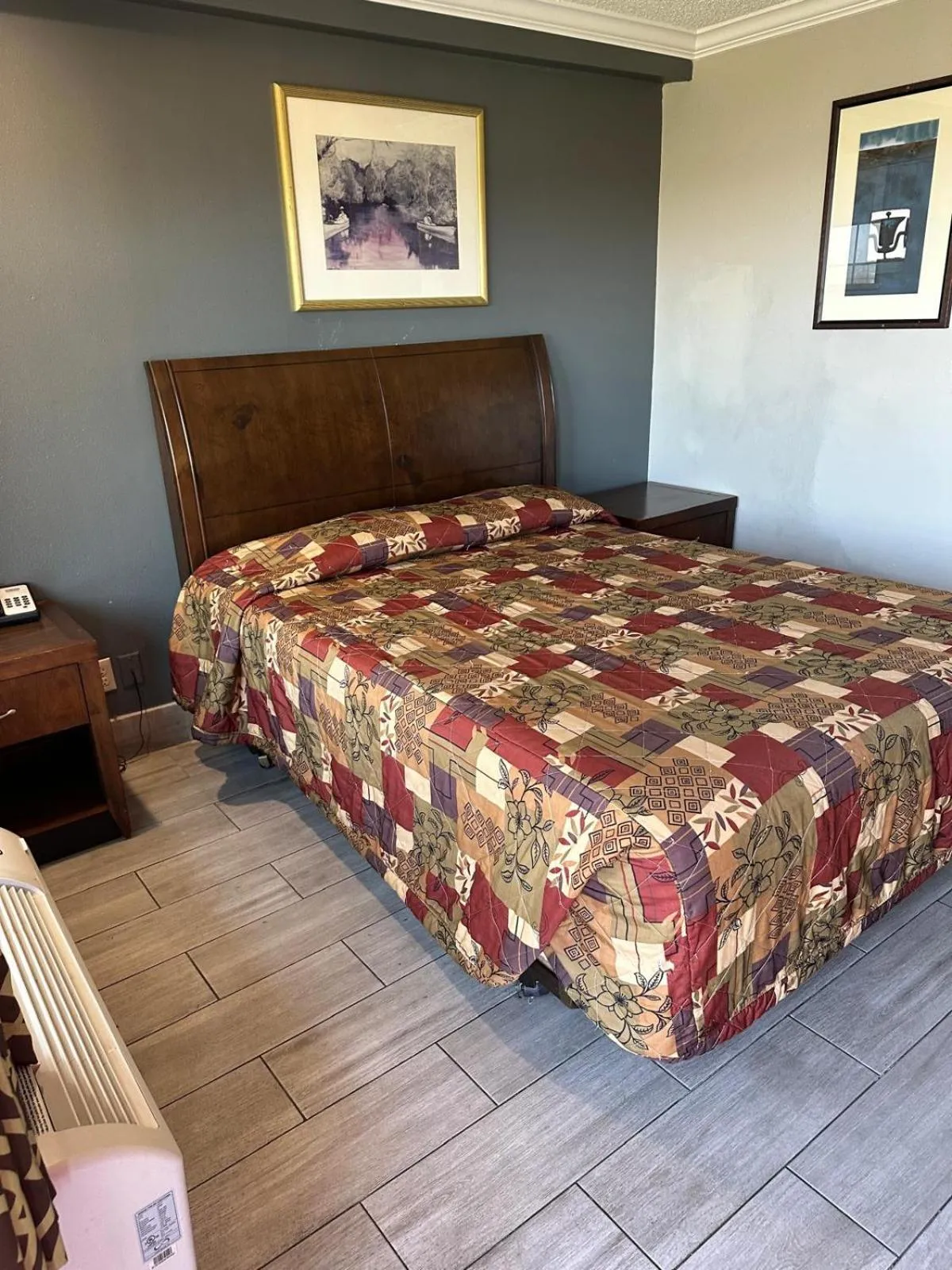 Bedroom in Heritage inn and suites