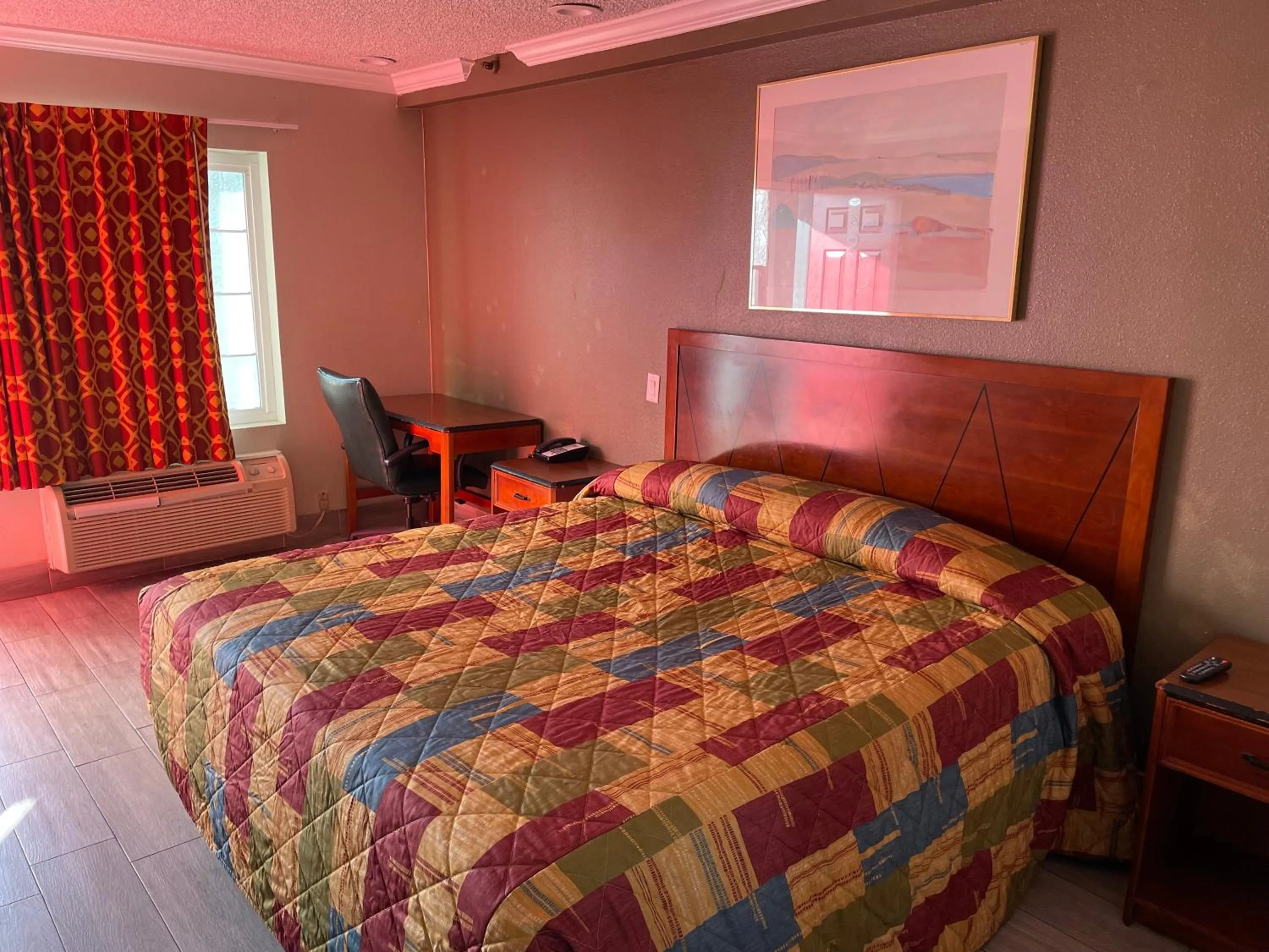 Bedroom in Heritage inn and suites