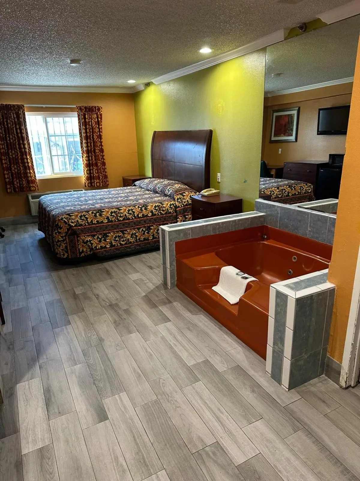 Bedroom in Heritage inn and suites