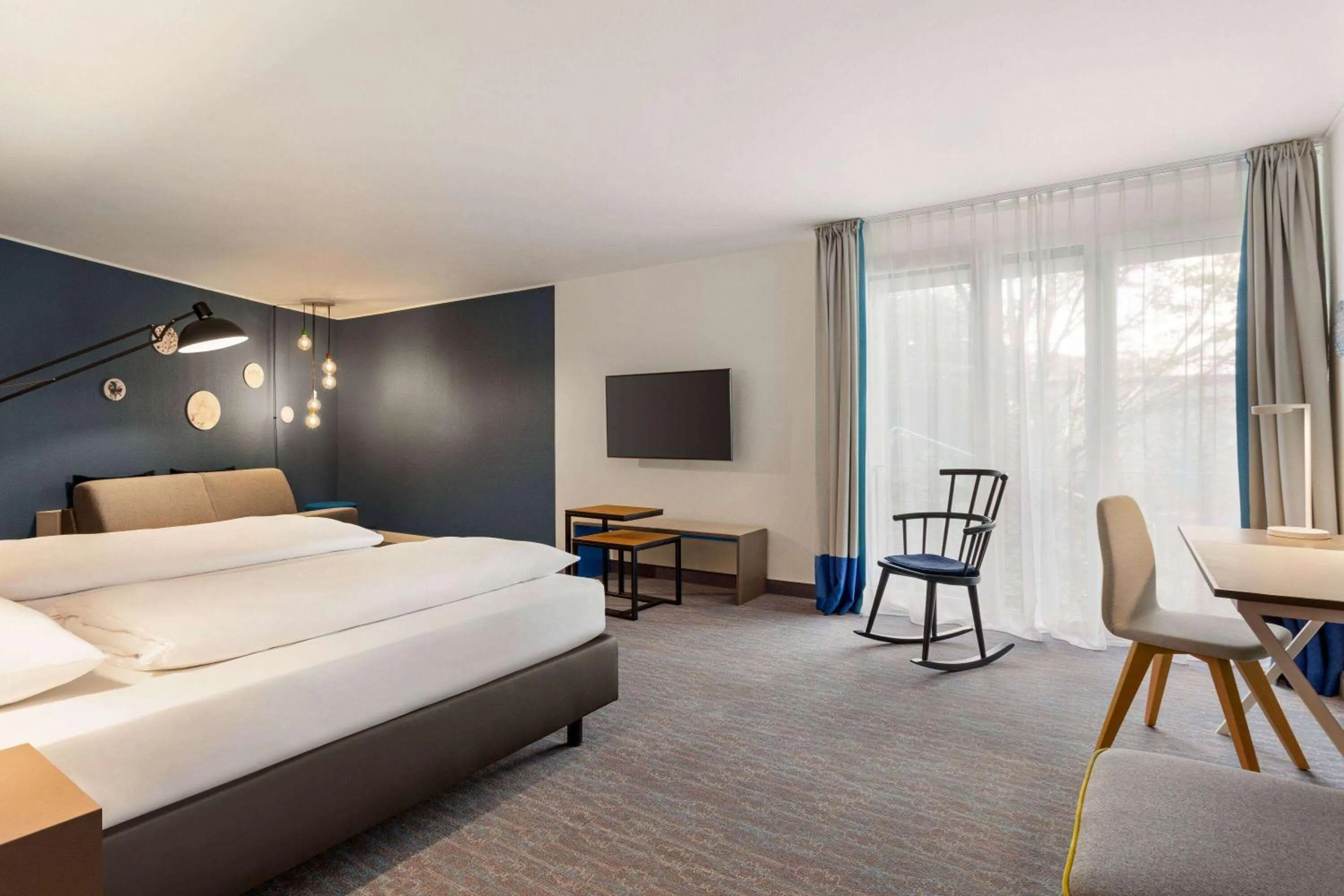 Photo of the whole room, Bed in Vienna House Easy by Wyndham Trier