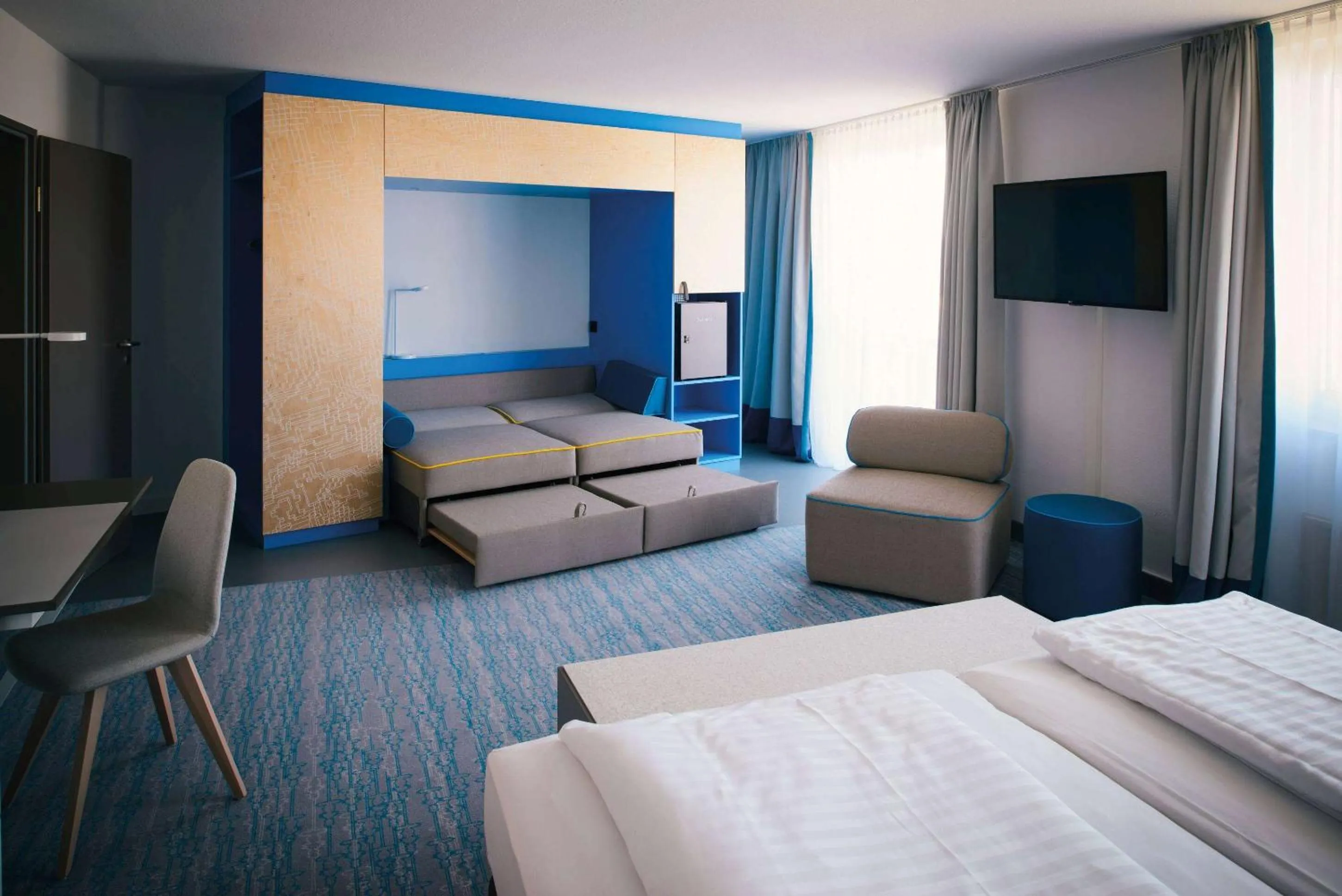 Photo of the whole room, Bed in Vienna House Easy by Wyndham Günzburg