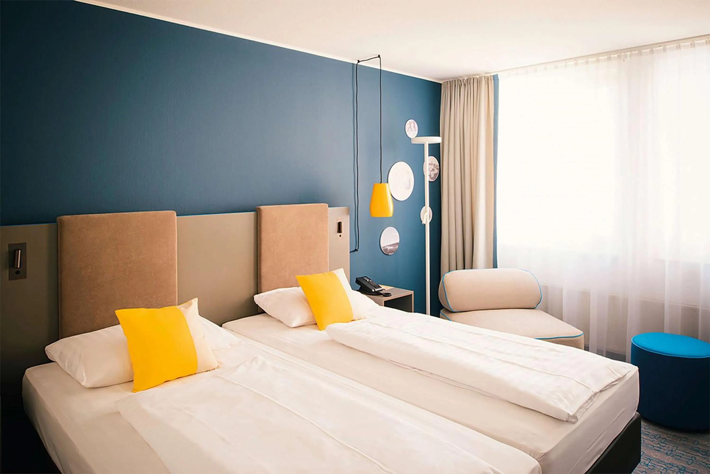 Photo of the whole room, Bed in Vienna House Easy by Wyndham Günzburg