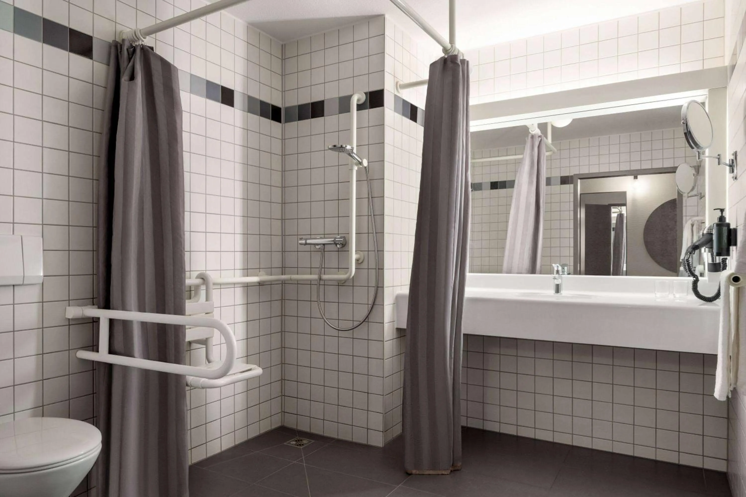 Shower in Vienna House Easy by Wyndham Günzburg