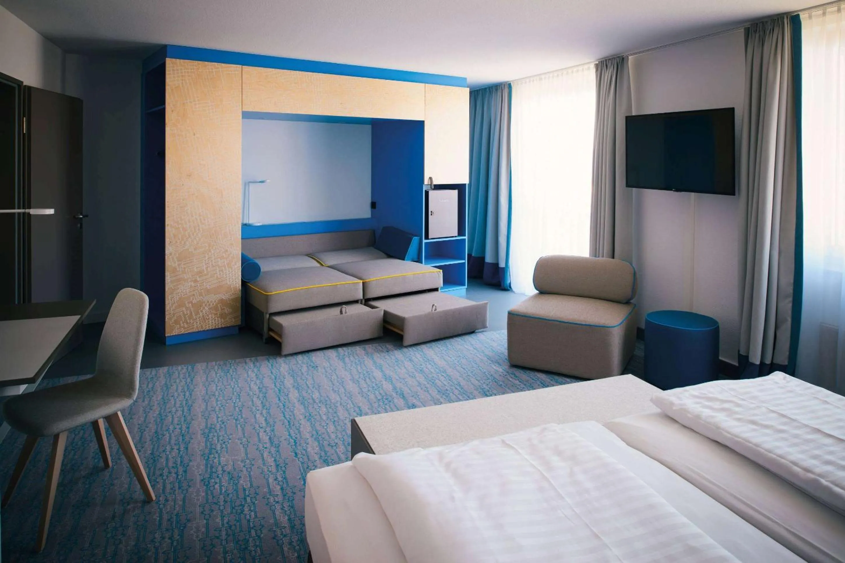 Photo of the whole room, Bed in Vienna House Easy by Wyndham Günzburg