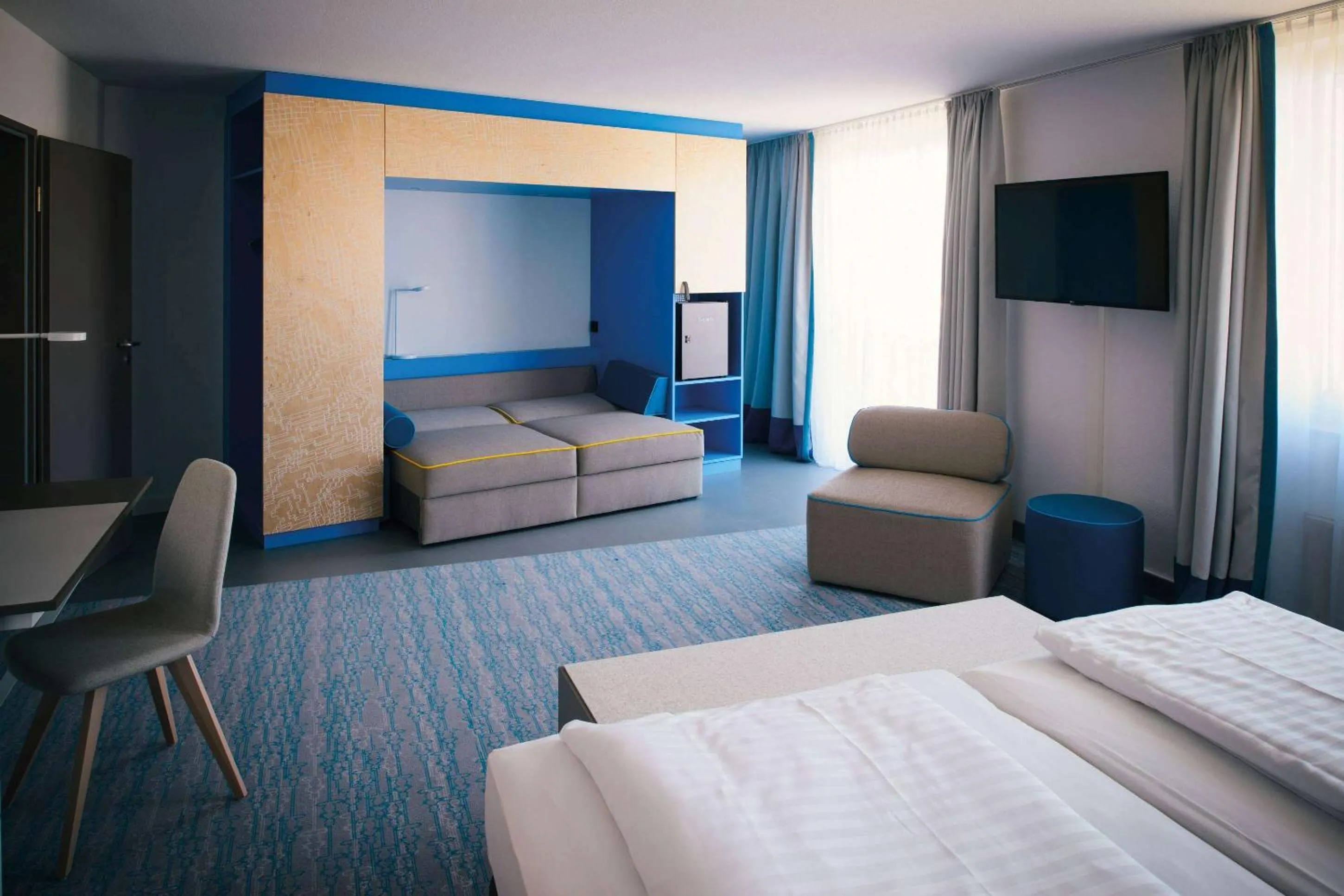 Photo of the whole room, Bed in Vienna House Easy by Wyndham Günzburg