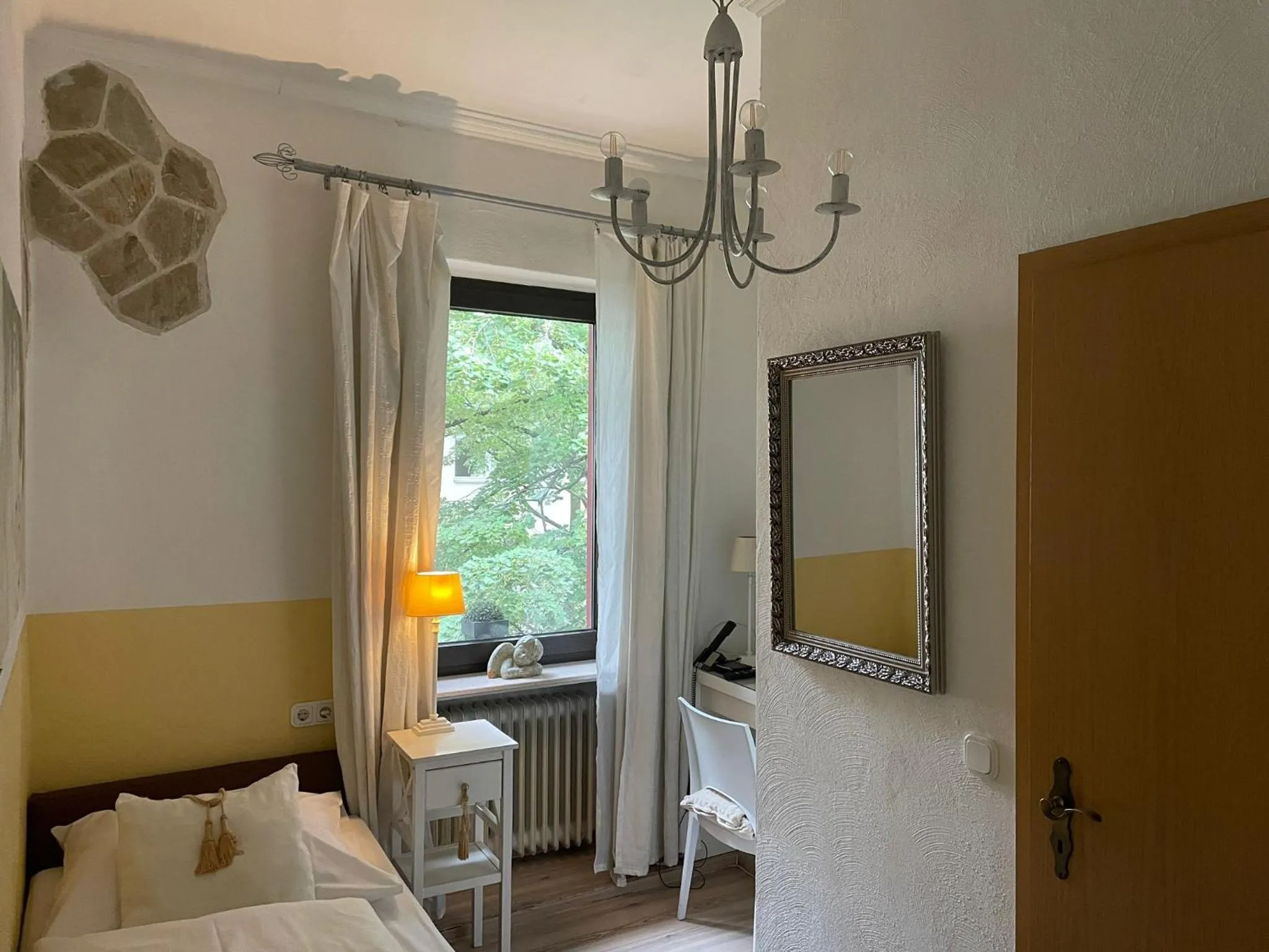 Photo of the whole room, Bed in Hotel Am Volksgarten