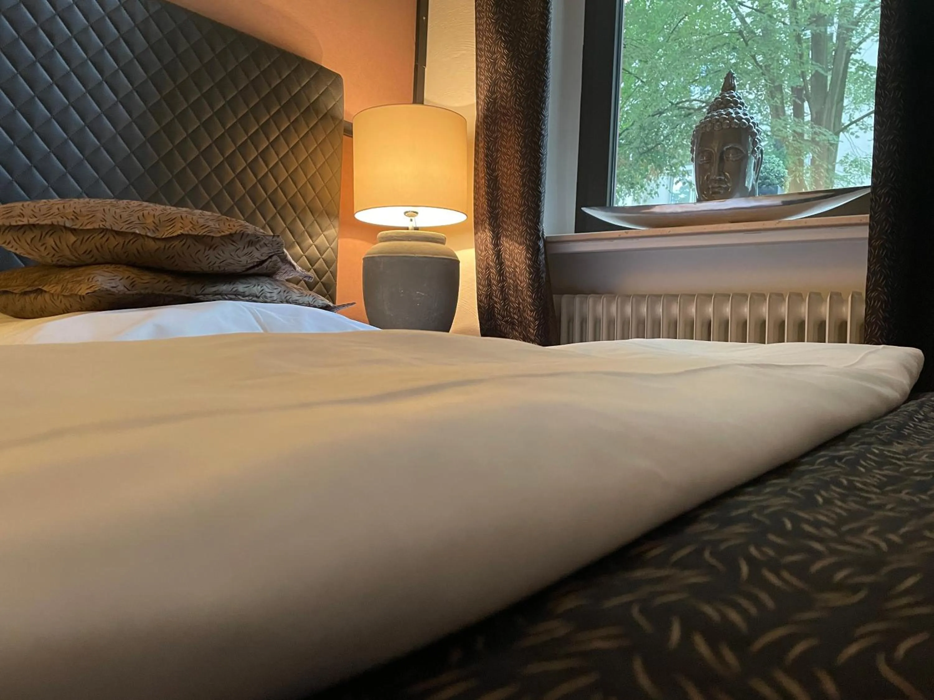 Bed in Hotel Am Volksgarten