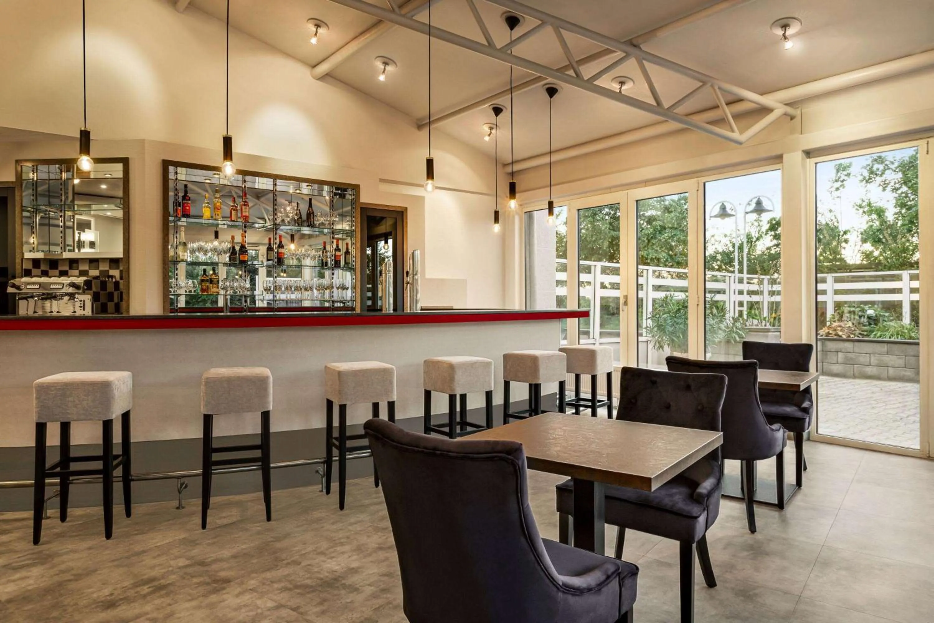 Lounge or bar in Ramada by Wyndham Halle-Leipzig