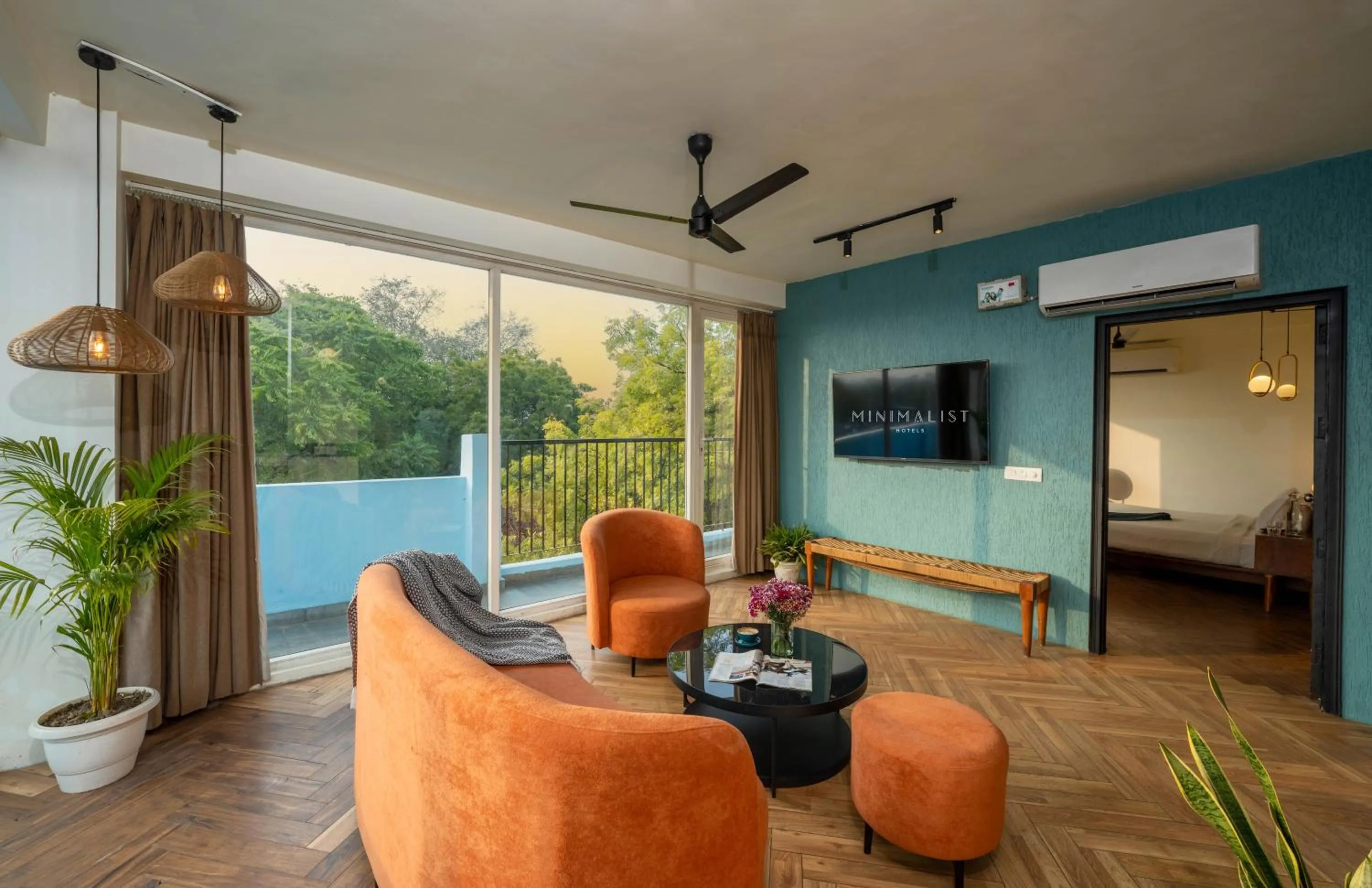 Seating area in Minimalist Poshtel & Suites