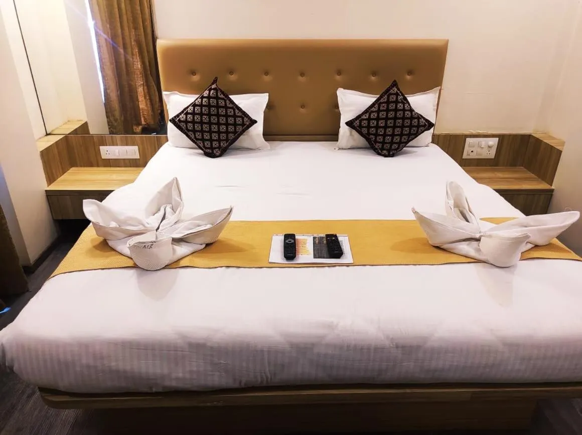 Bed in Hotel Manasi Royal