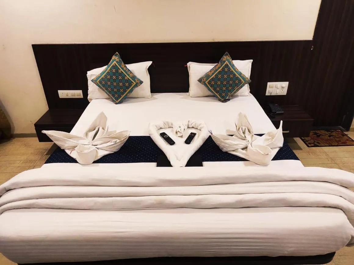 Bed in Hotel Manasi Royal