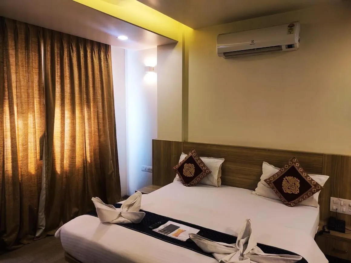 Bed in Hotel Manasi Royal