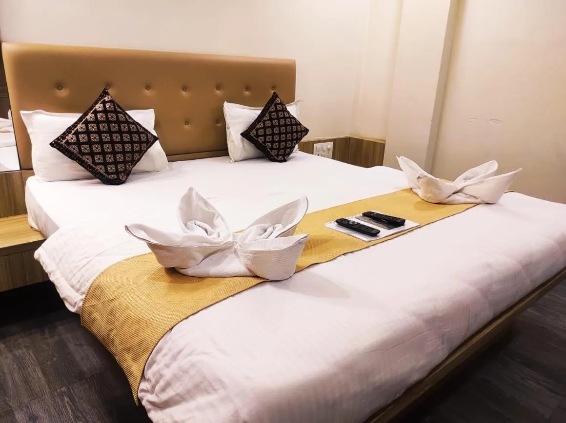 Bed in Hotel Manasi Royal