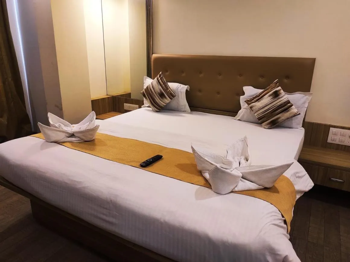 Bed in Hotel Manasi Royal