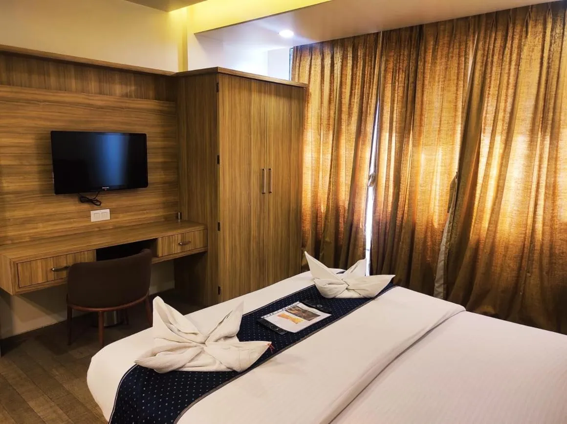 Bed in Hotel Manasi Royal