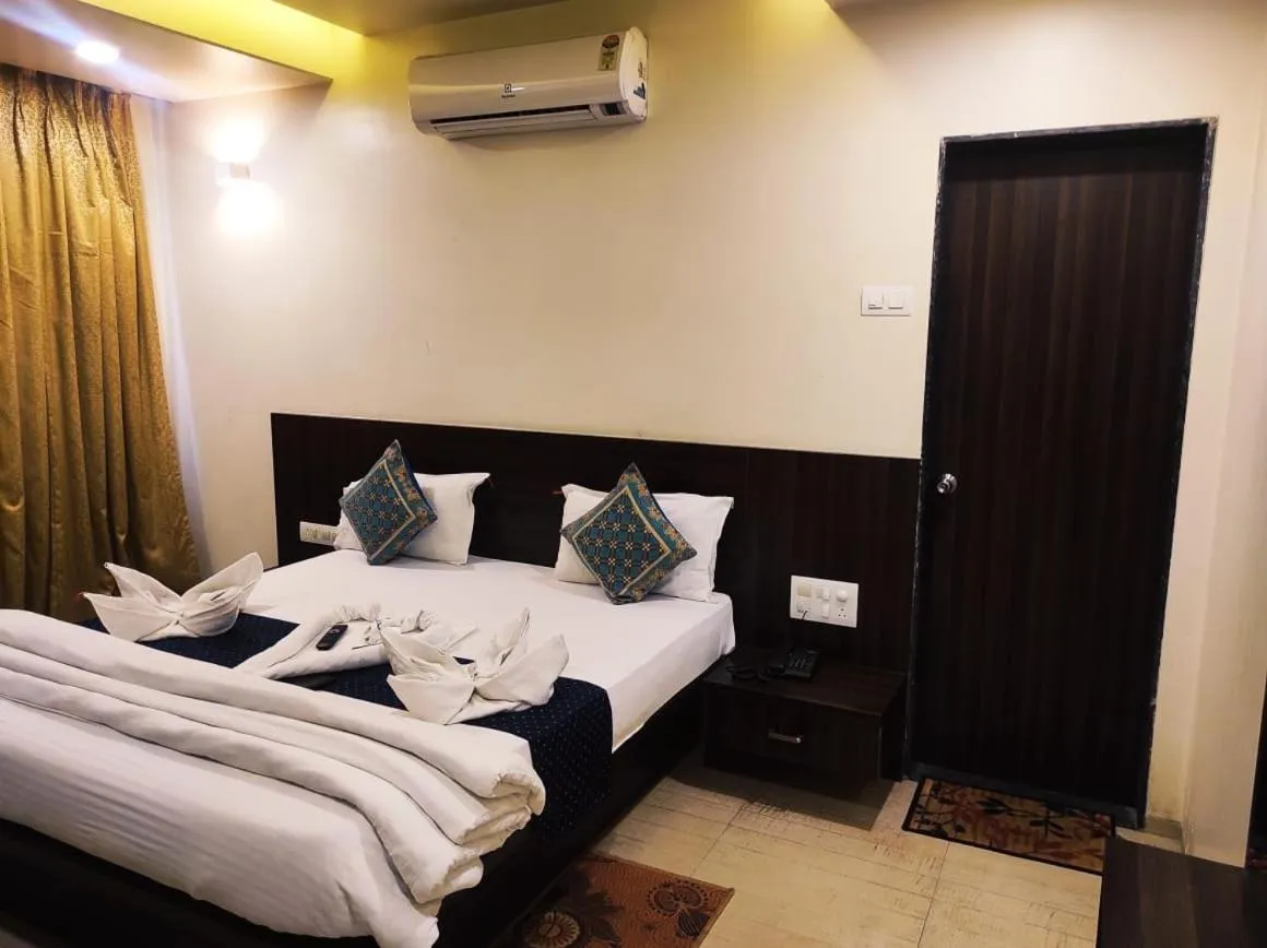 Bed in Hotel Manasi Royal