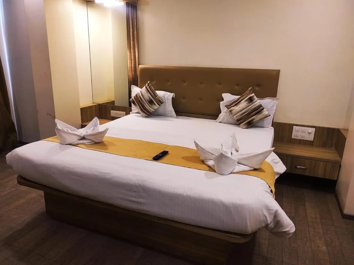 Bed in Hotel Manasi Royal