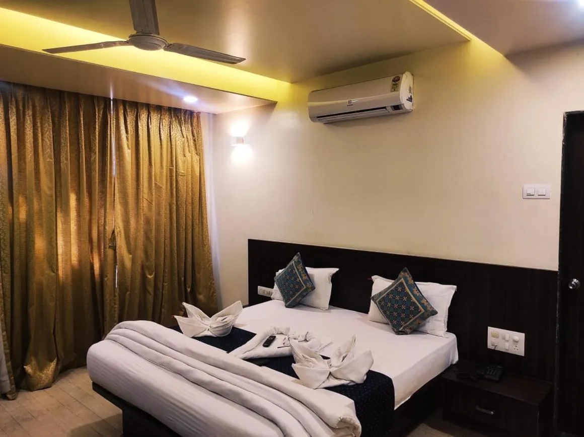 Bed in Hotel Manasi Royal