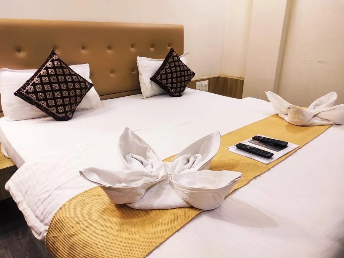 Bed in Hotel Manasi Royal