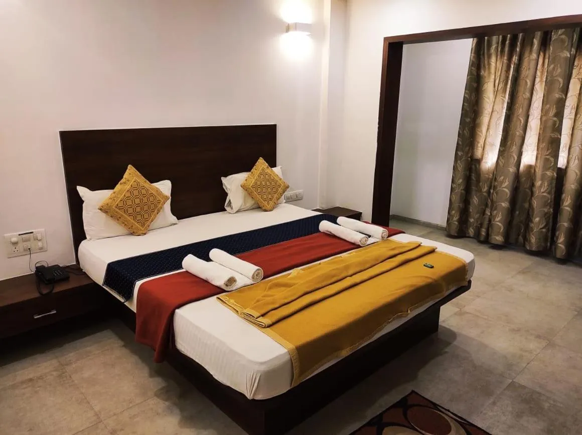 Bed in Hotel Manasi INN