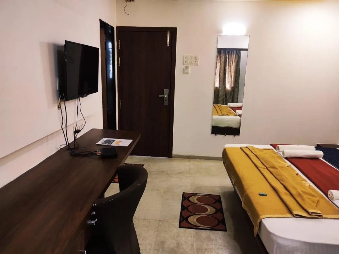 TV and multimedia, Bed in Hotel Manasi INN