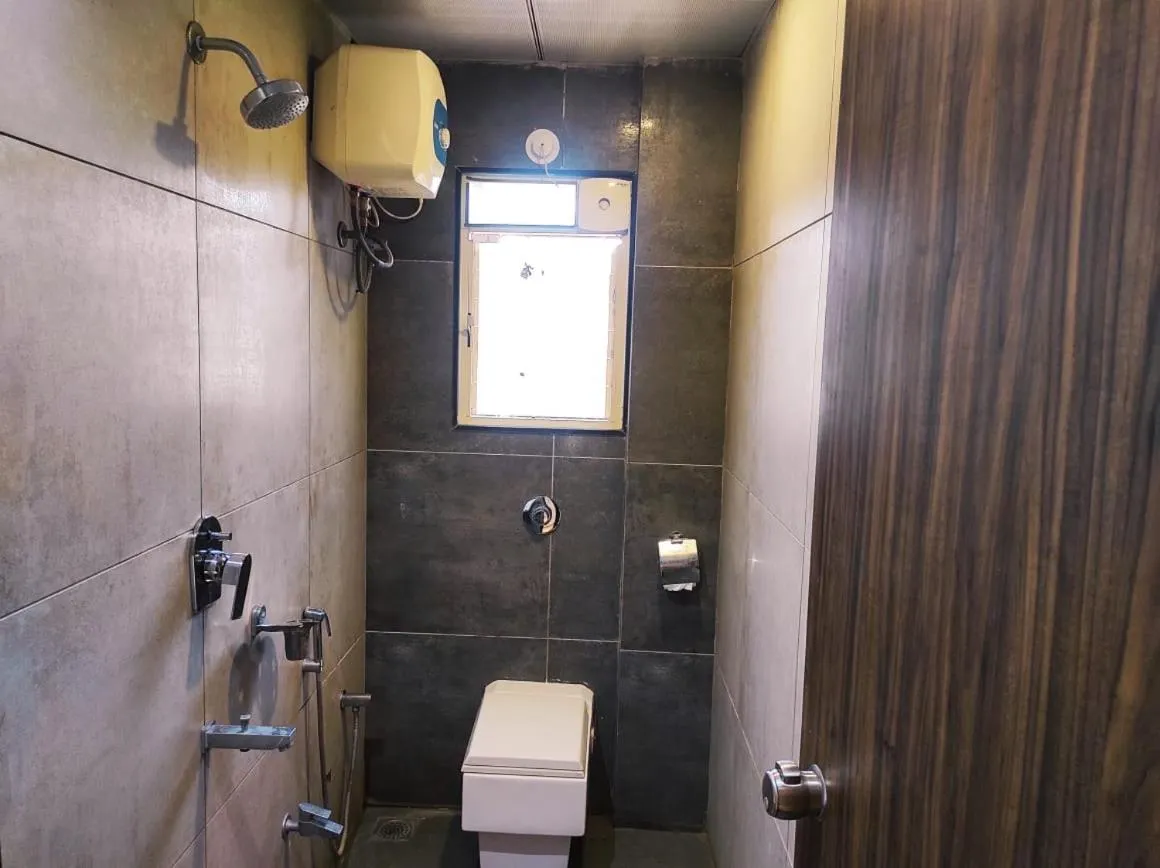 Bathroom in Hotel Manasi INN