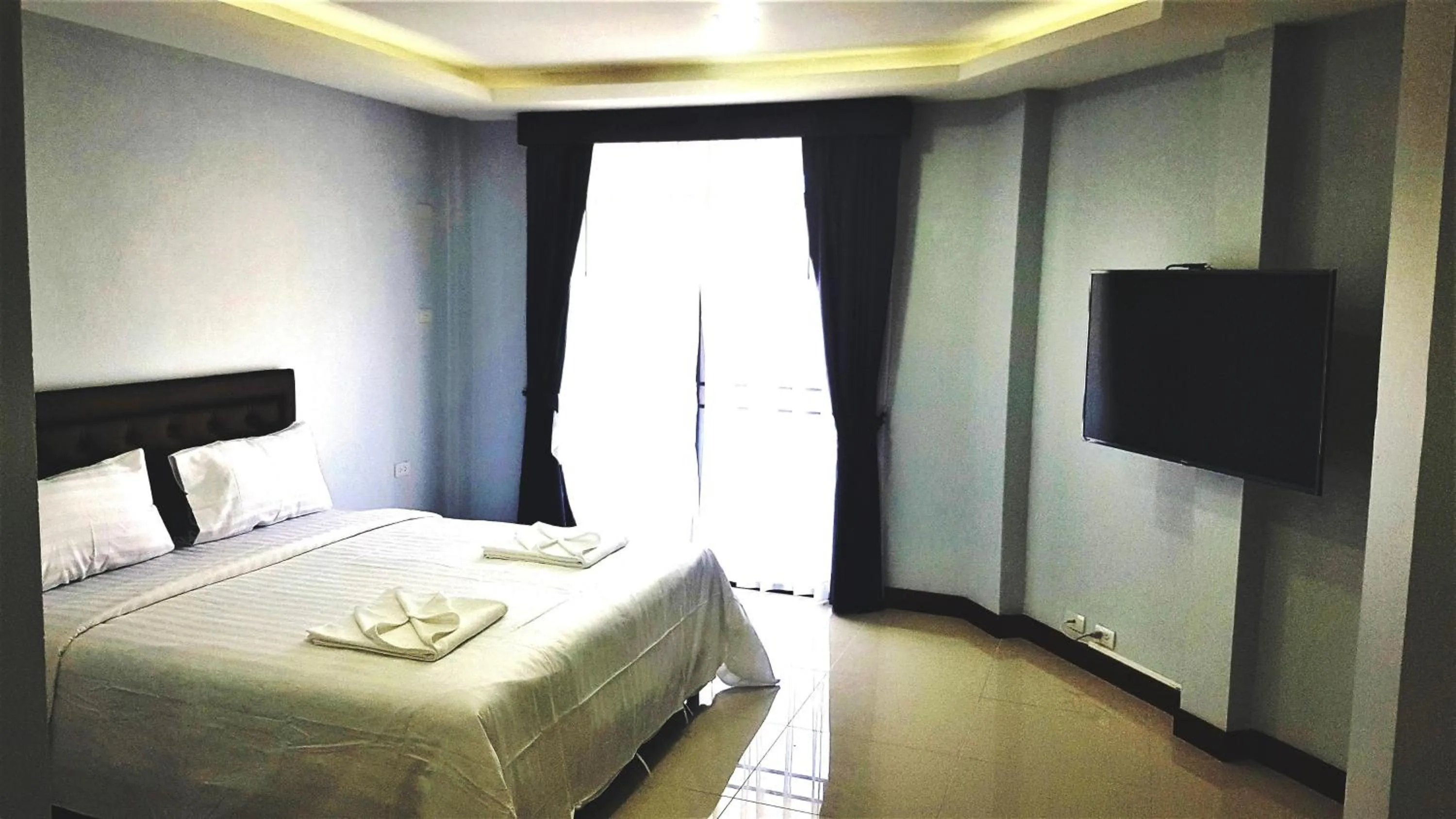 Photo of the whole room, Bed in La Capannina Hotel Patong