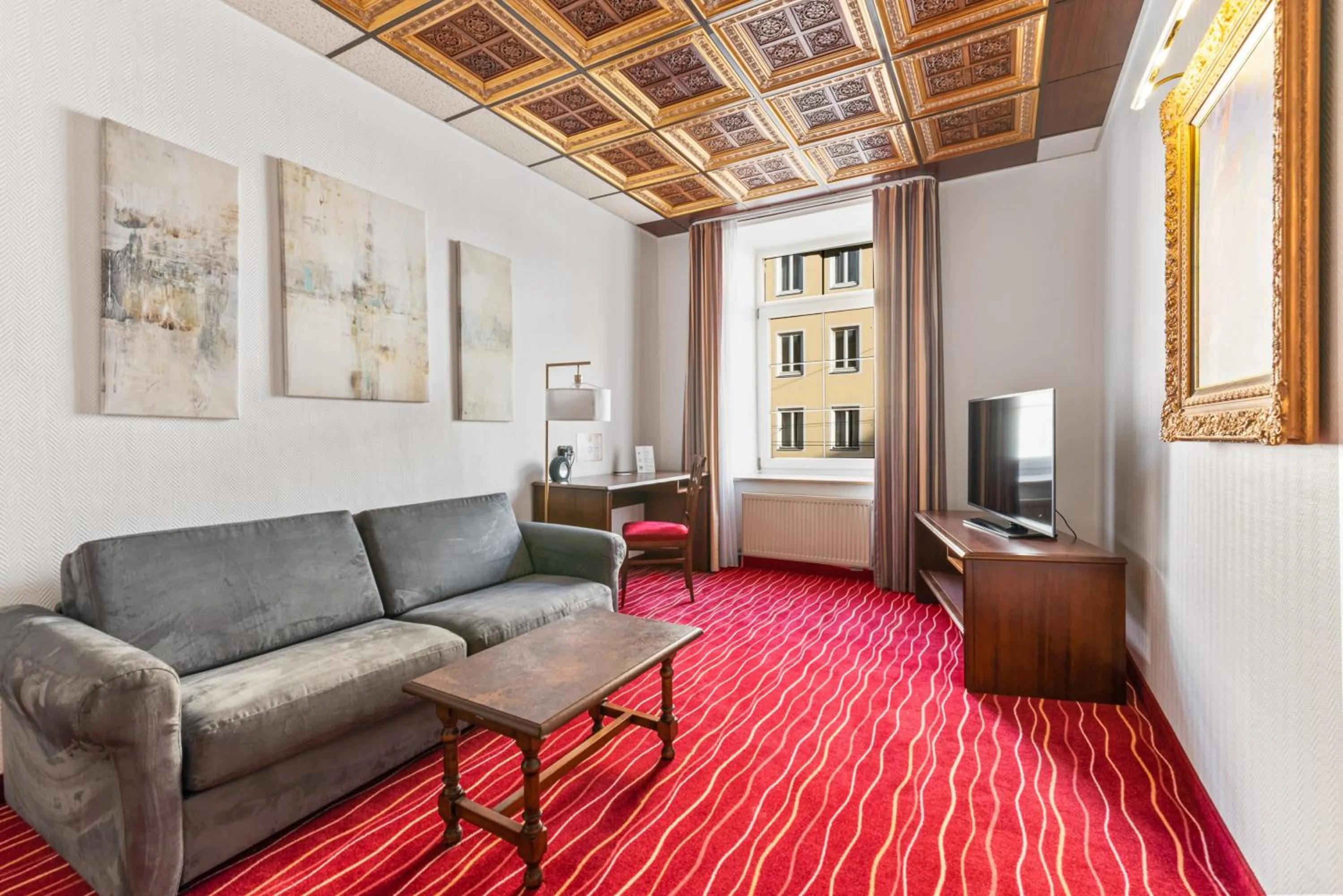 Seating area in KING's Hotel First