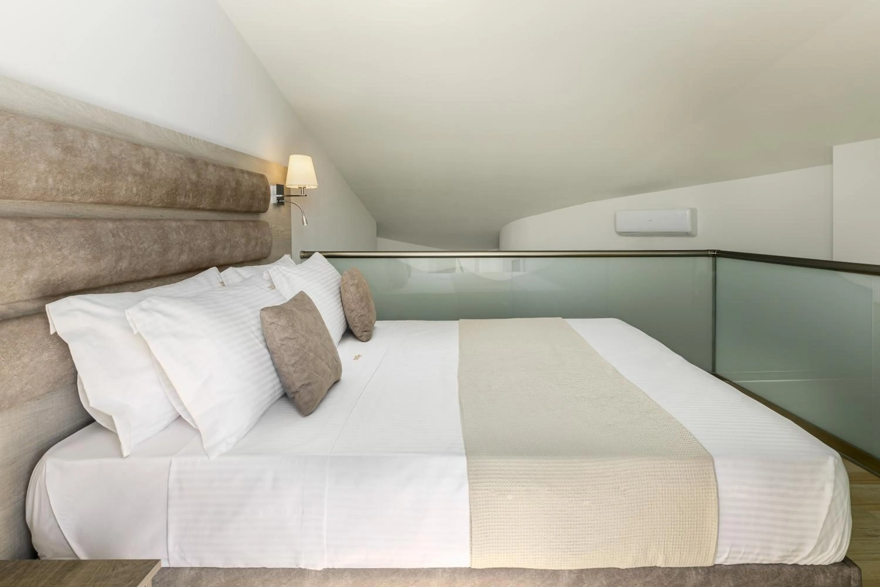 Bed in Aria Garden Suites