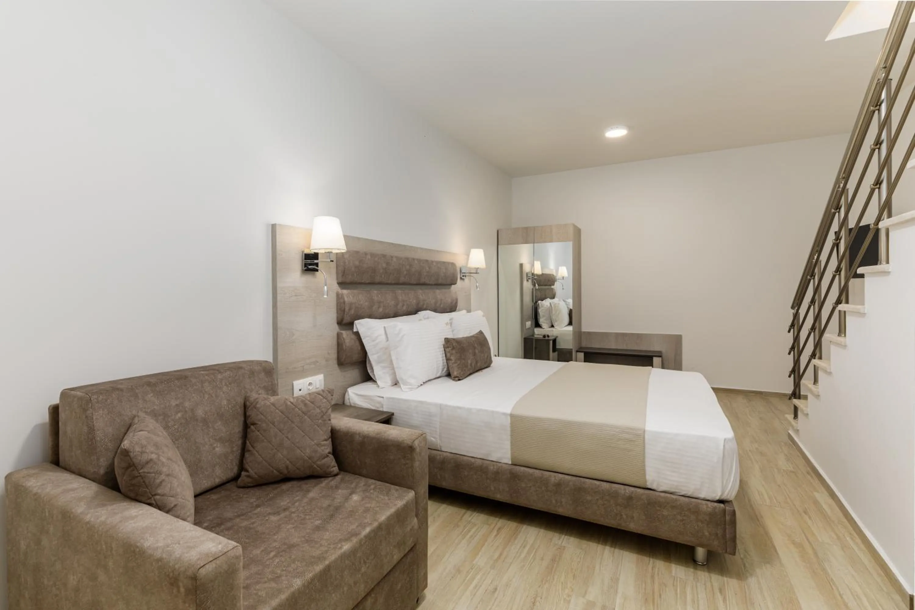 Bed in Aria Garden Suites