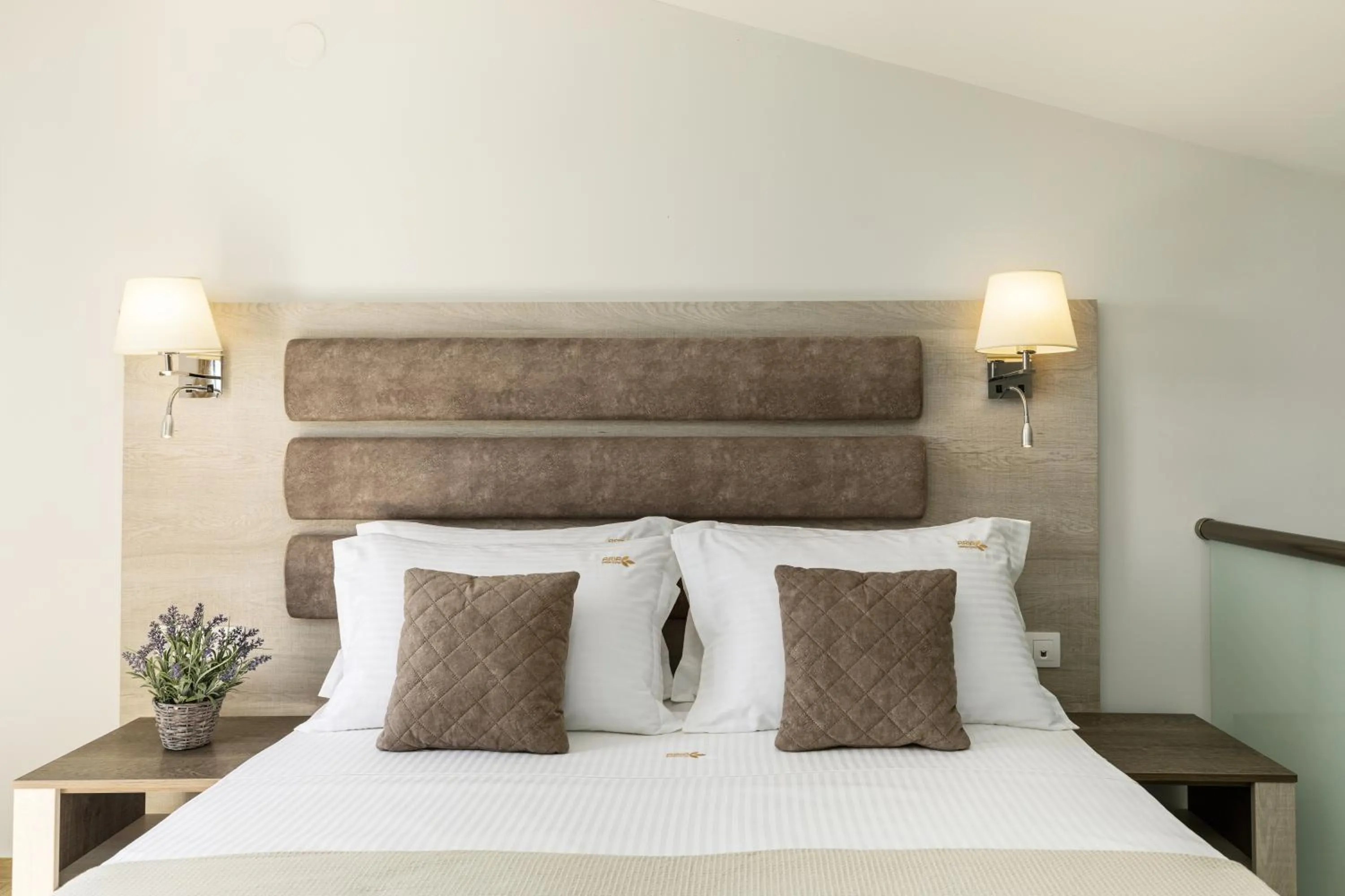 Bed in Aria Garden Suites