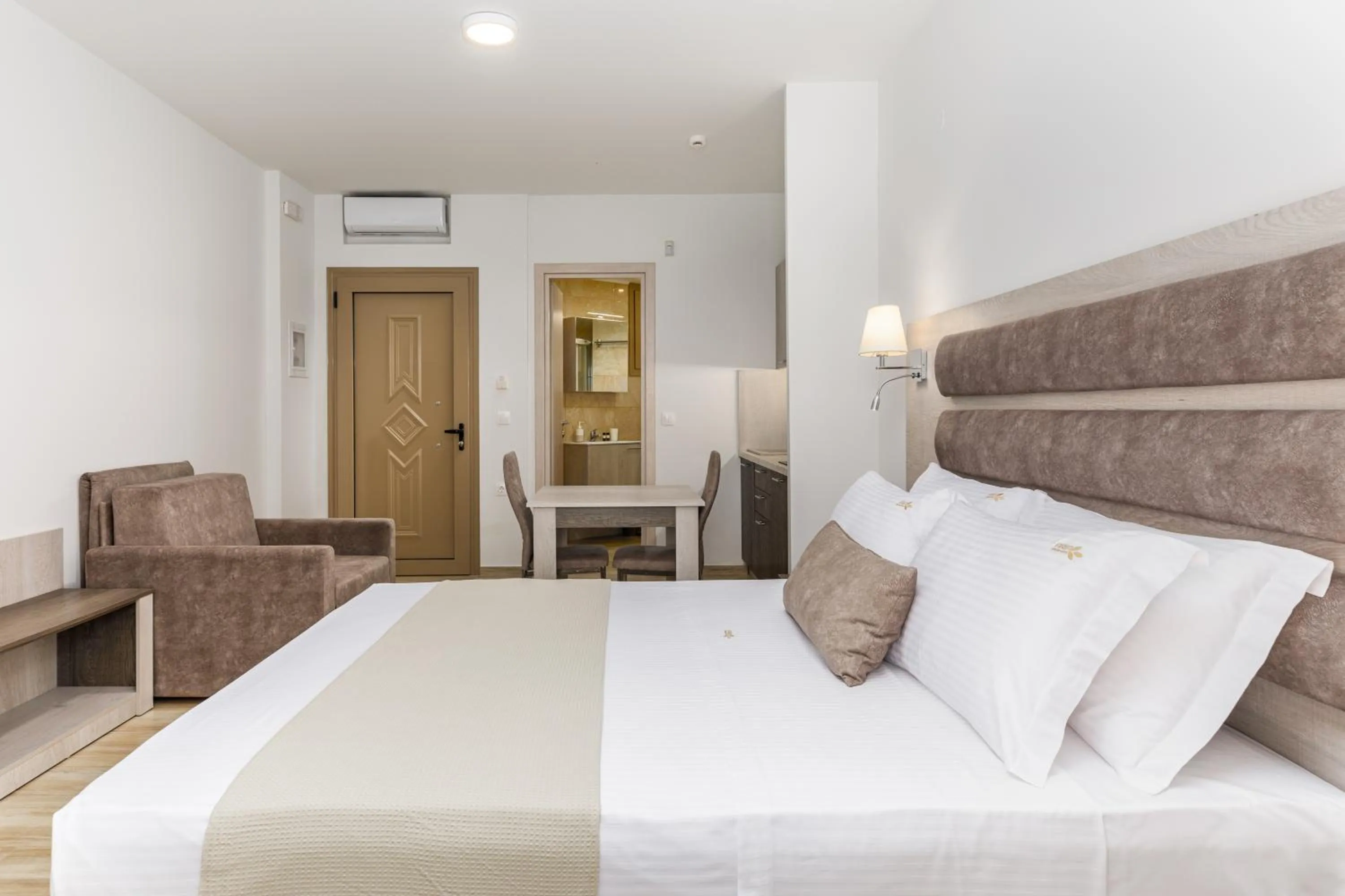 Bed in Aria Garden Suites