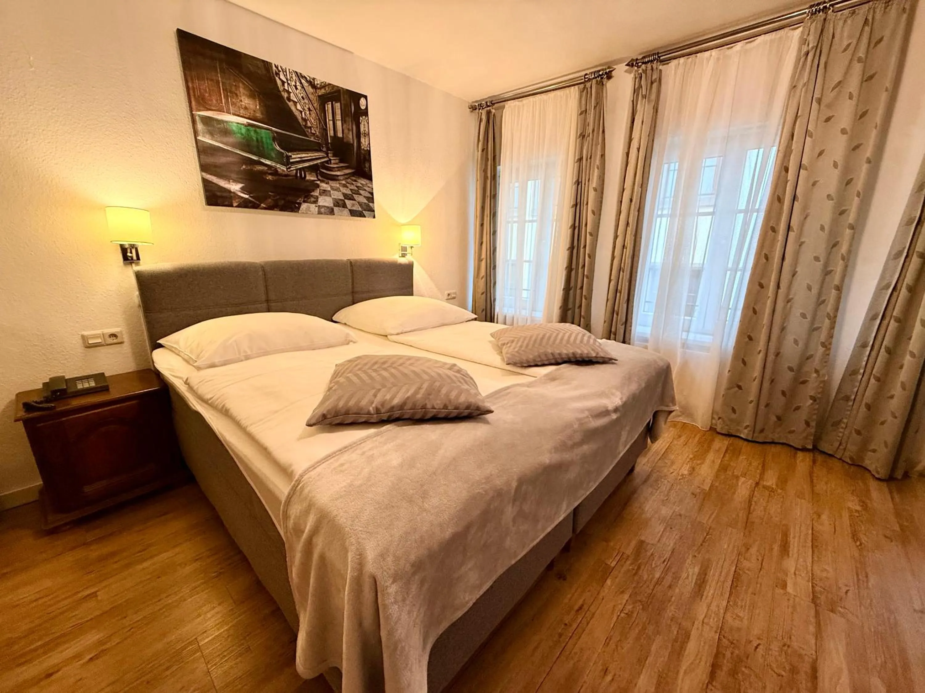 Bed in Altstadthotel Hayk am Rhein