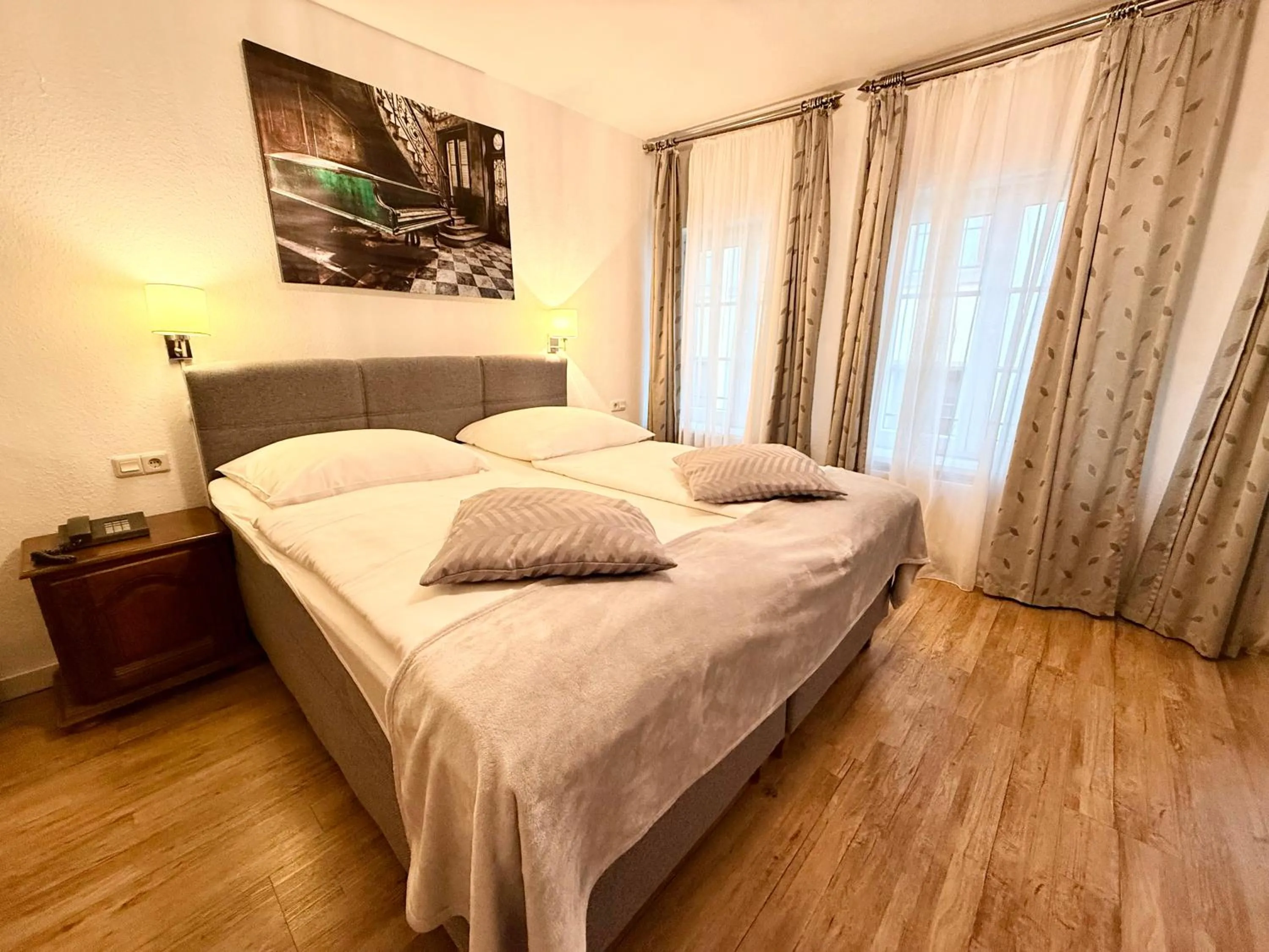 Bed in Altstadthotel Hayk am Rhein