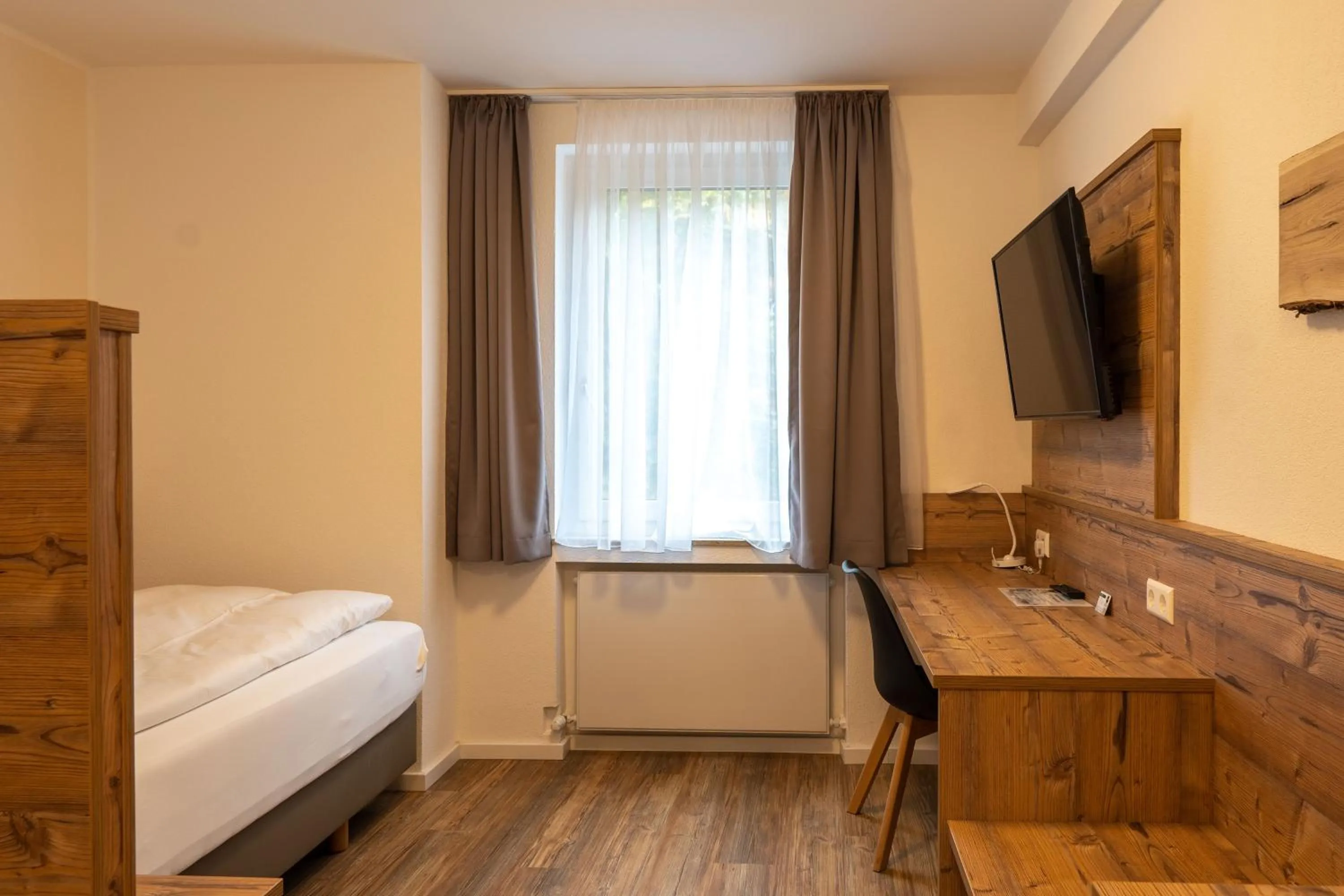 Bed in Hotel Post mit Klimaanlage