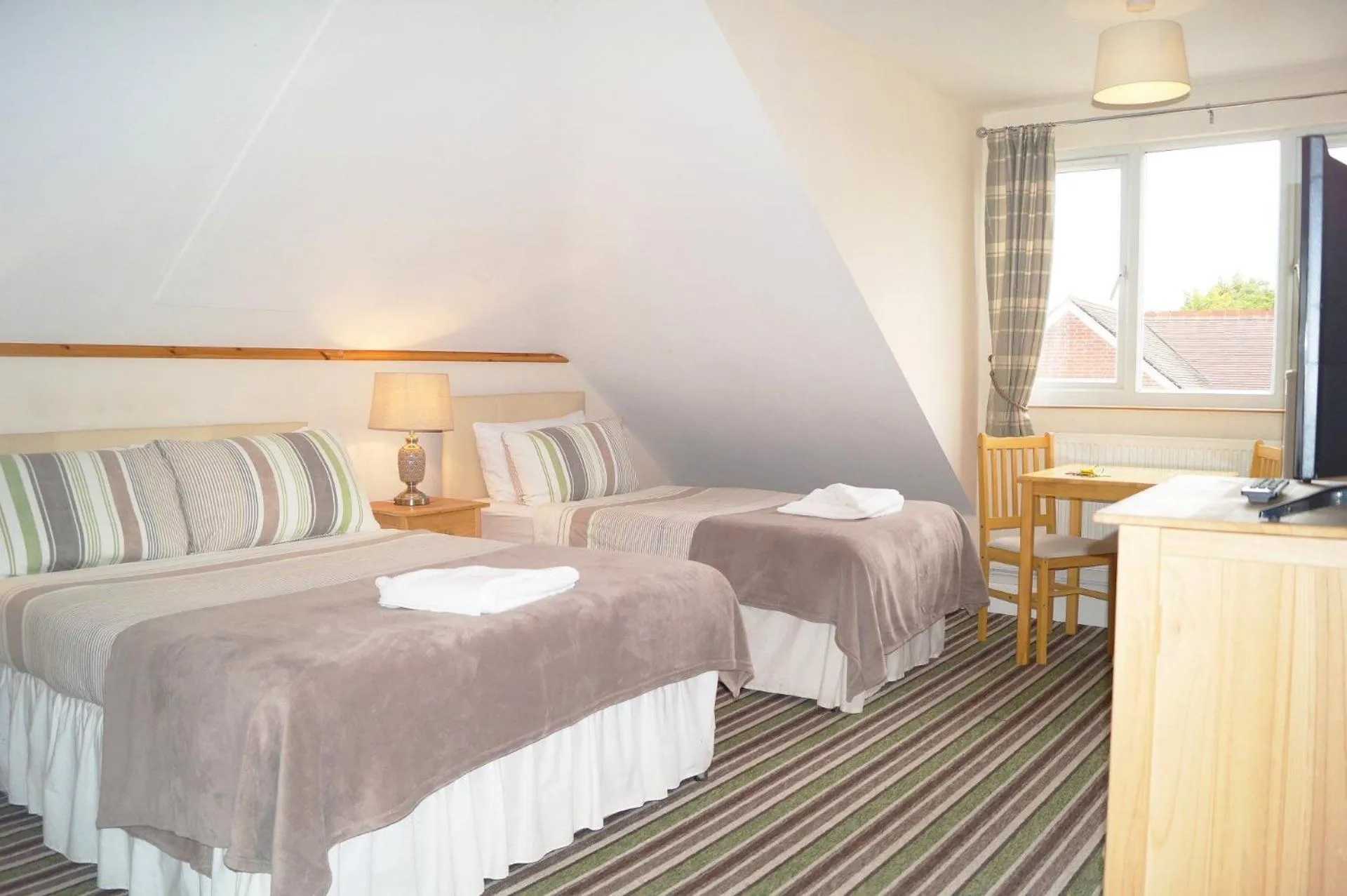 Photo of the whole room, Bed in Ricky Road Guest House - Premium