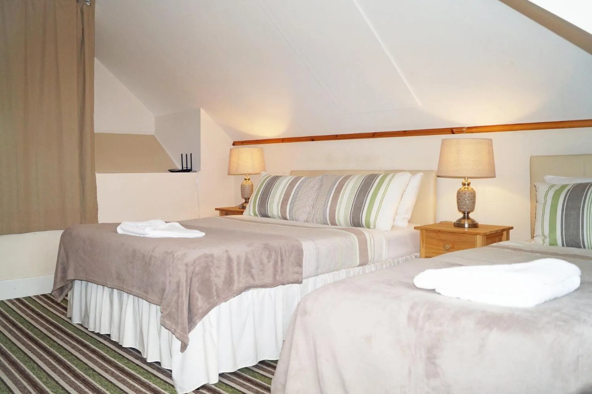 Photo of the whole room, Bed in Ricky Road Guest House - Premium